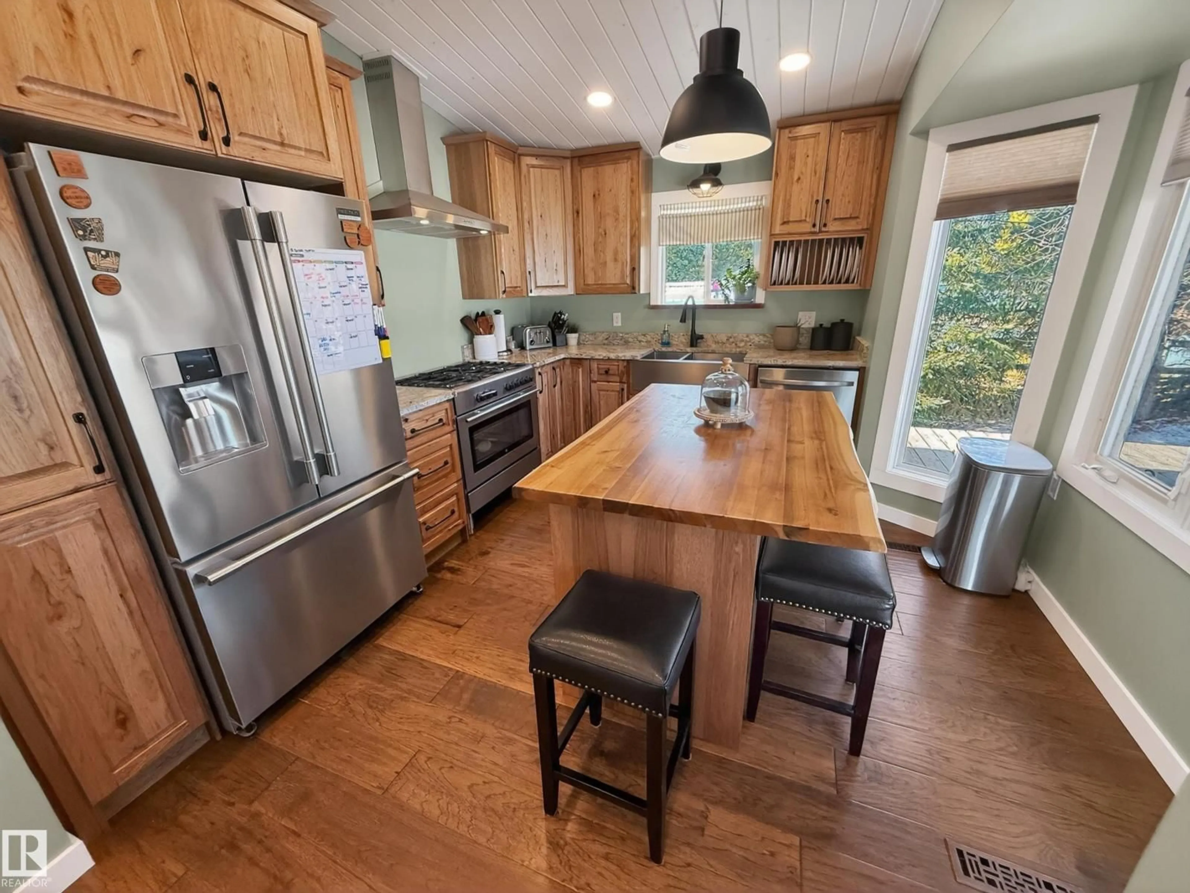 Open concept kitchen, wood/laminate floor for 18 26503 TWP ROAD 511, Rural Parkland County Alberta T7Y1G4