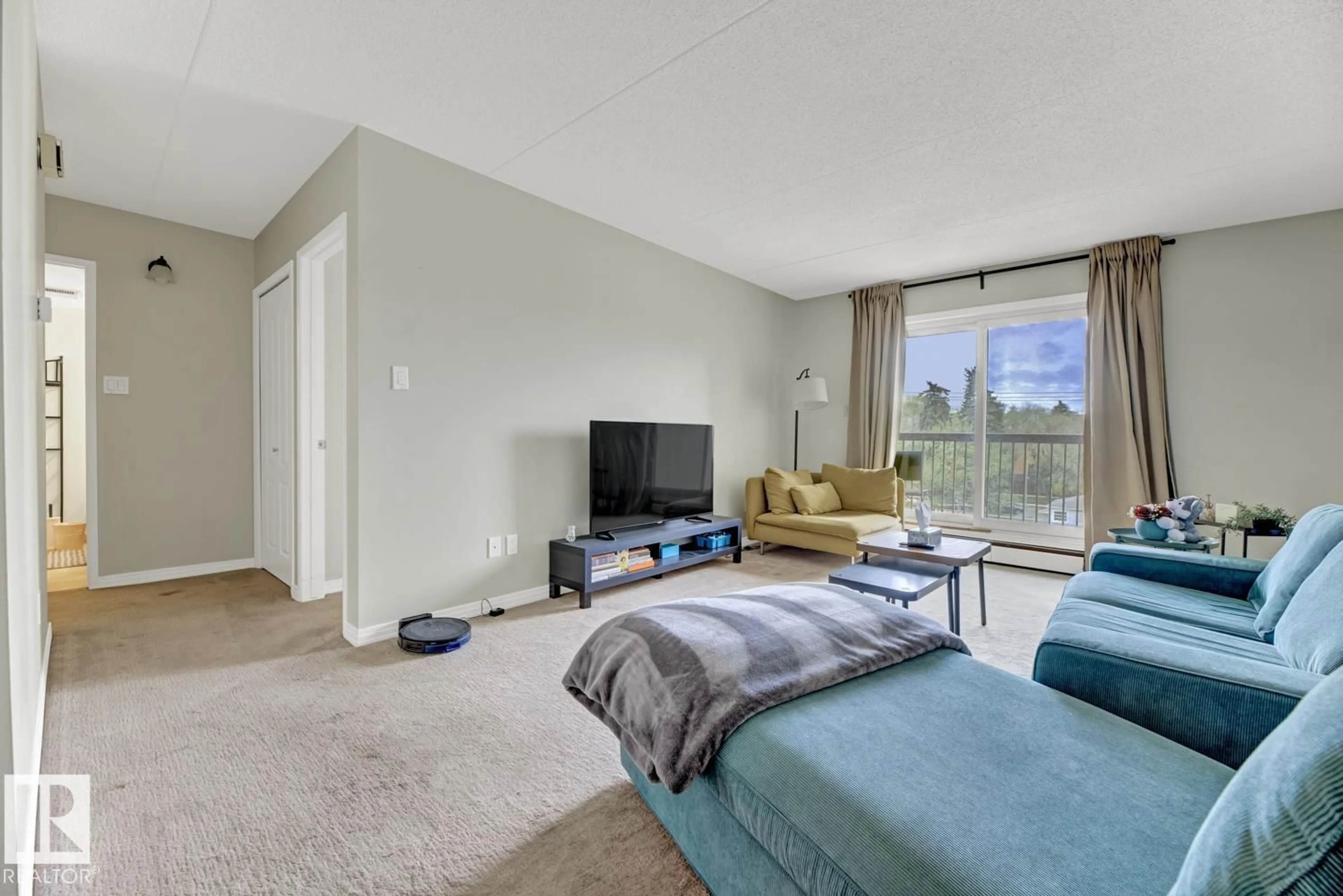 Living room with furniture, unknown for 400 - 11026 106 ST NW, Edmonton Alberta T5H2Y4