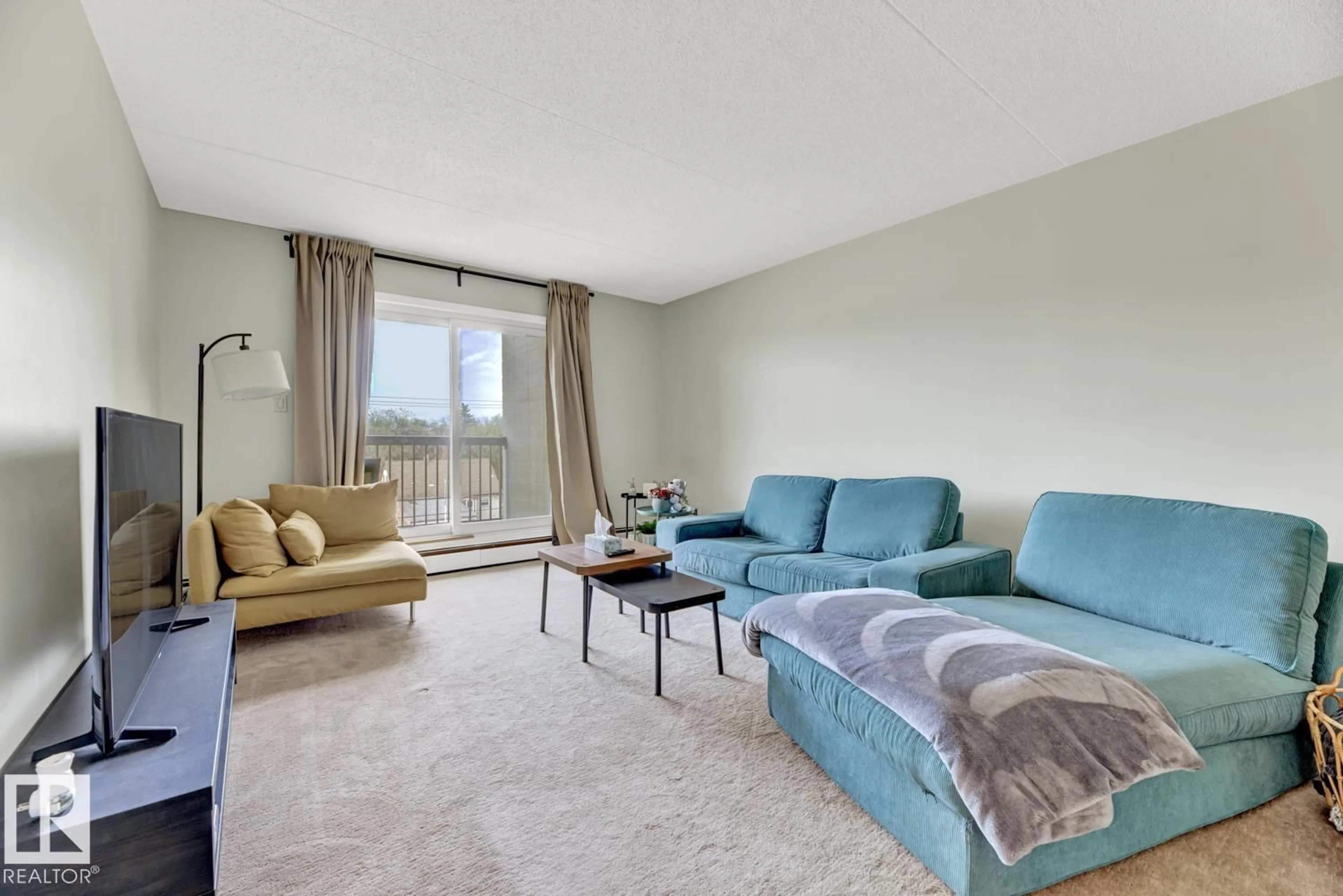 Living room with furniture, unknown for 400 - 11026 106 ST NW, Edmonton Alberta T5H2Y4