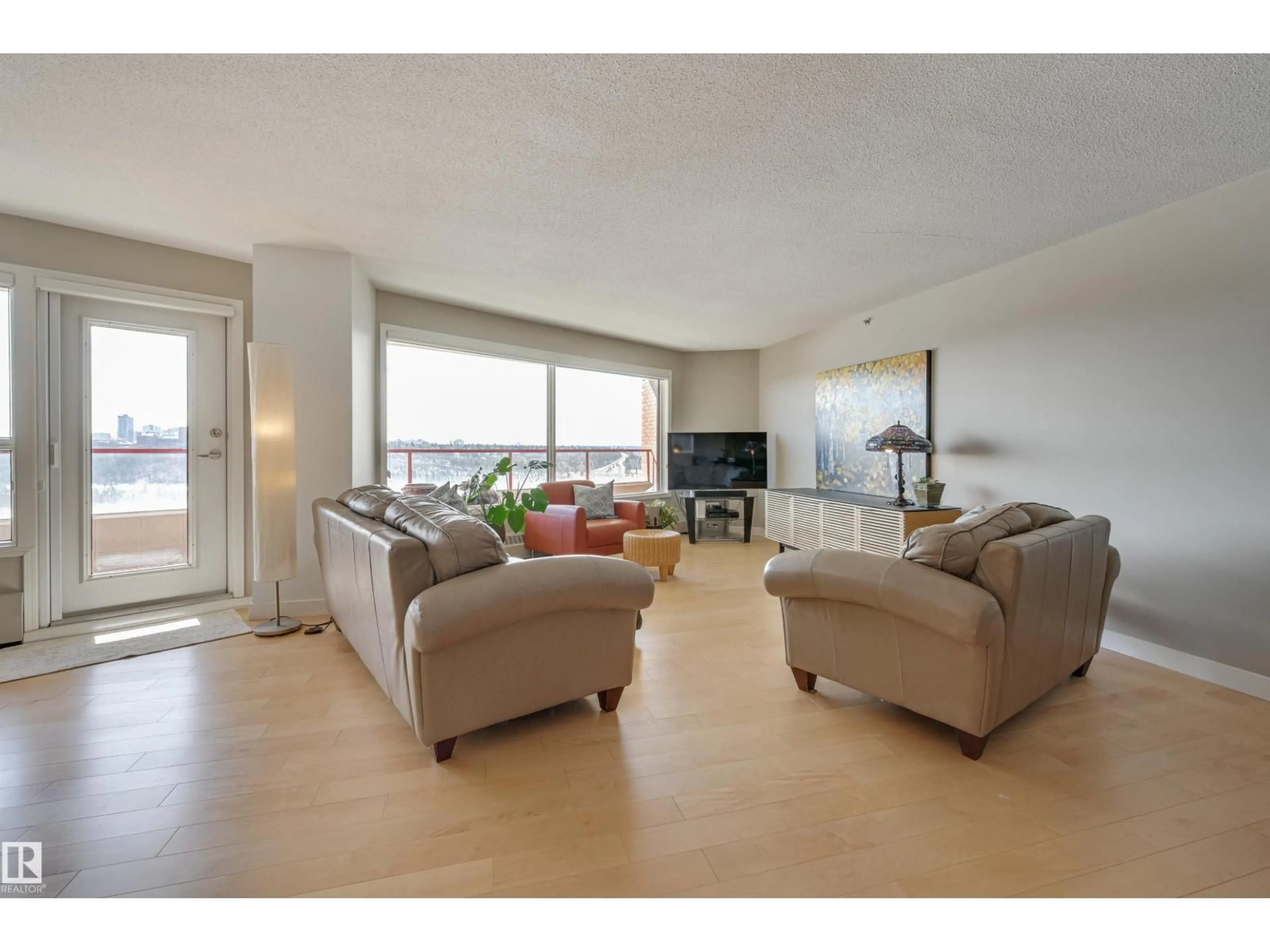Living room with furniture, unknown for 701 - 12319 JASPER AV, Edmonton Alberta T5N4A7