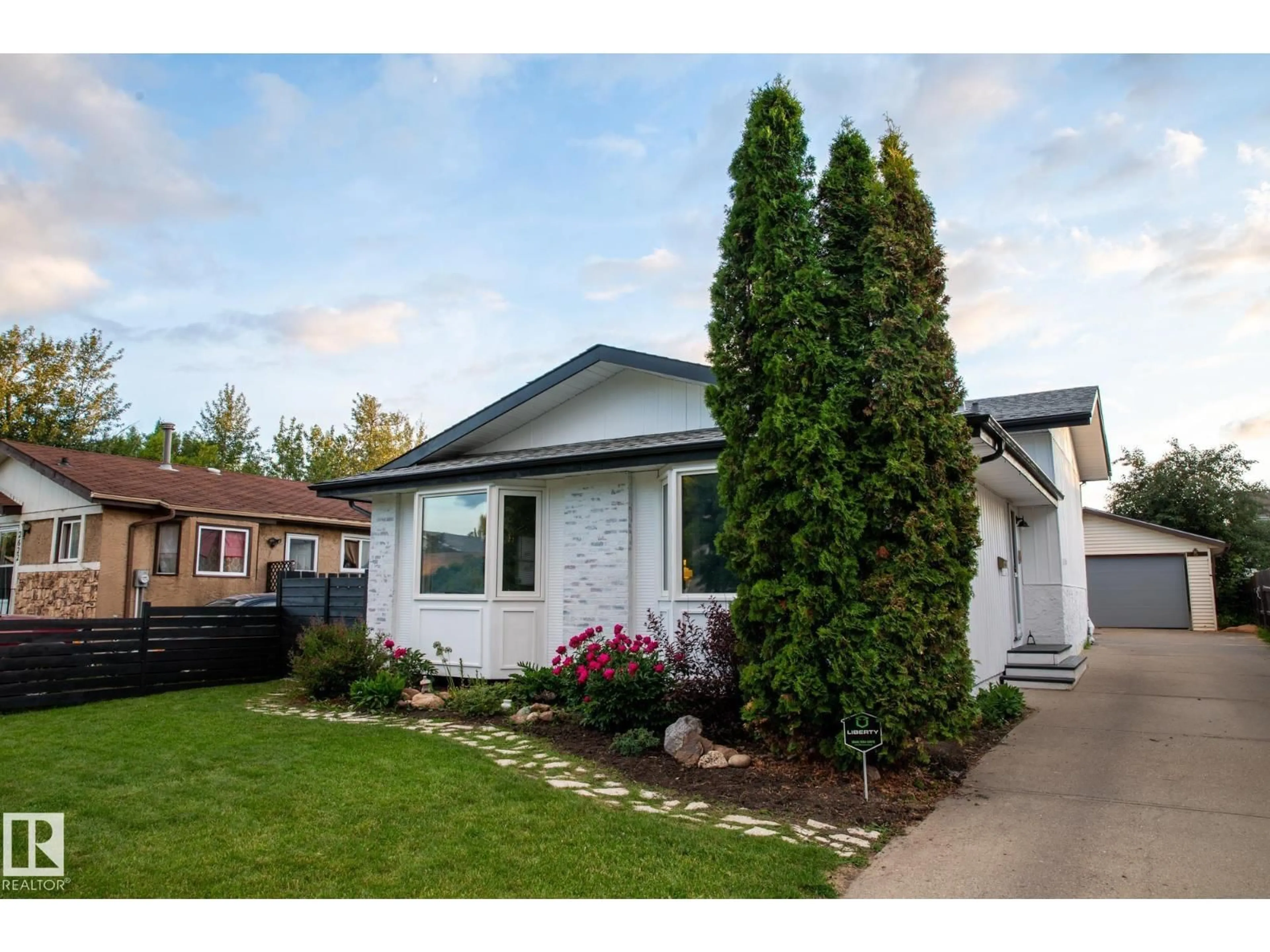 Home with vinyl exterior material, street for 2626 49 ST, Edmonton Alberta T6L3W9