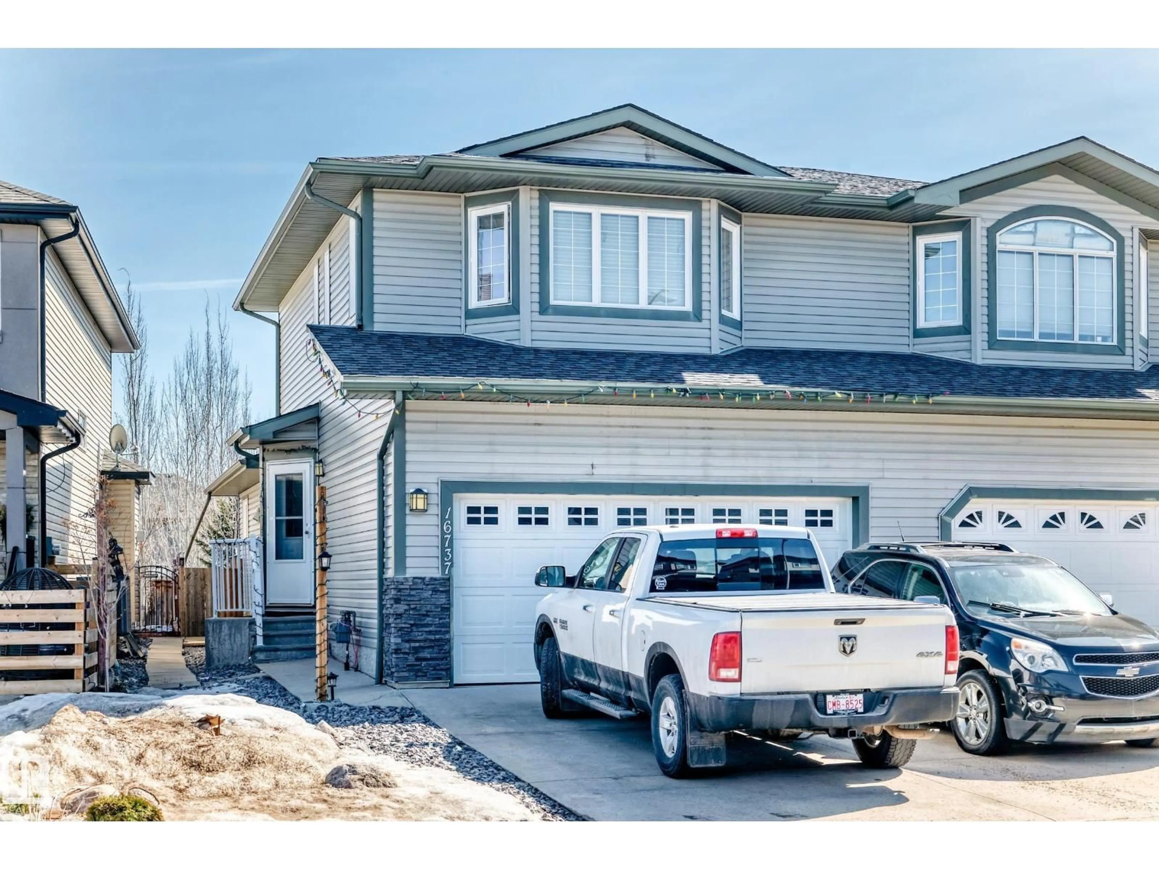 Home with vinyl exterior material, street for 16737 60ST NW, Edmonton Alberta T5Y0W5