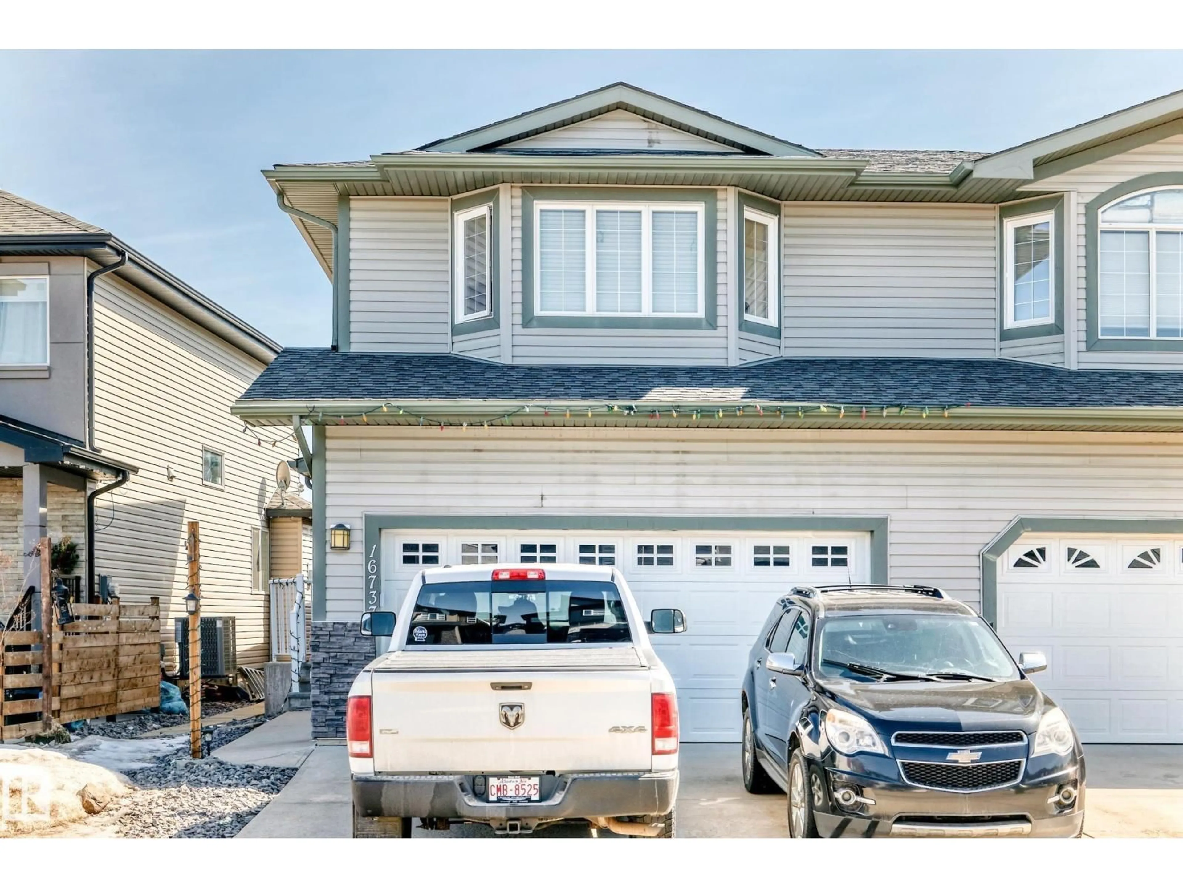 Home with vinyl exterior material, street for 16737 60ST NW, Edmonton Alberta T5Y0W5