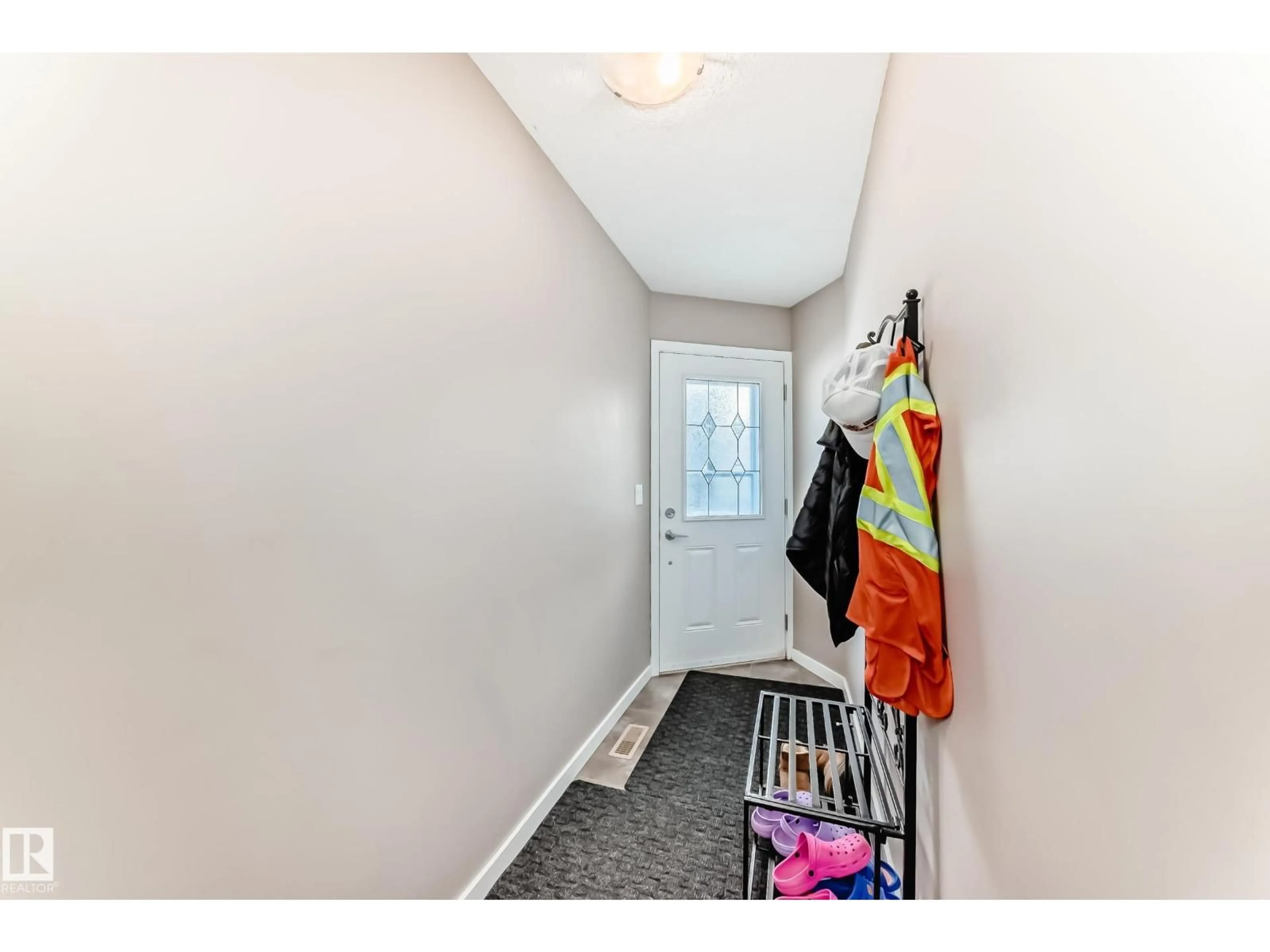 Indoor entryway for 16737 60ST NW, Edmonton Alberta T5Y0W5