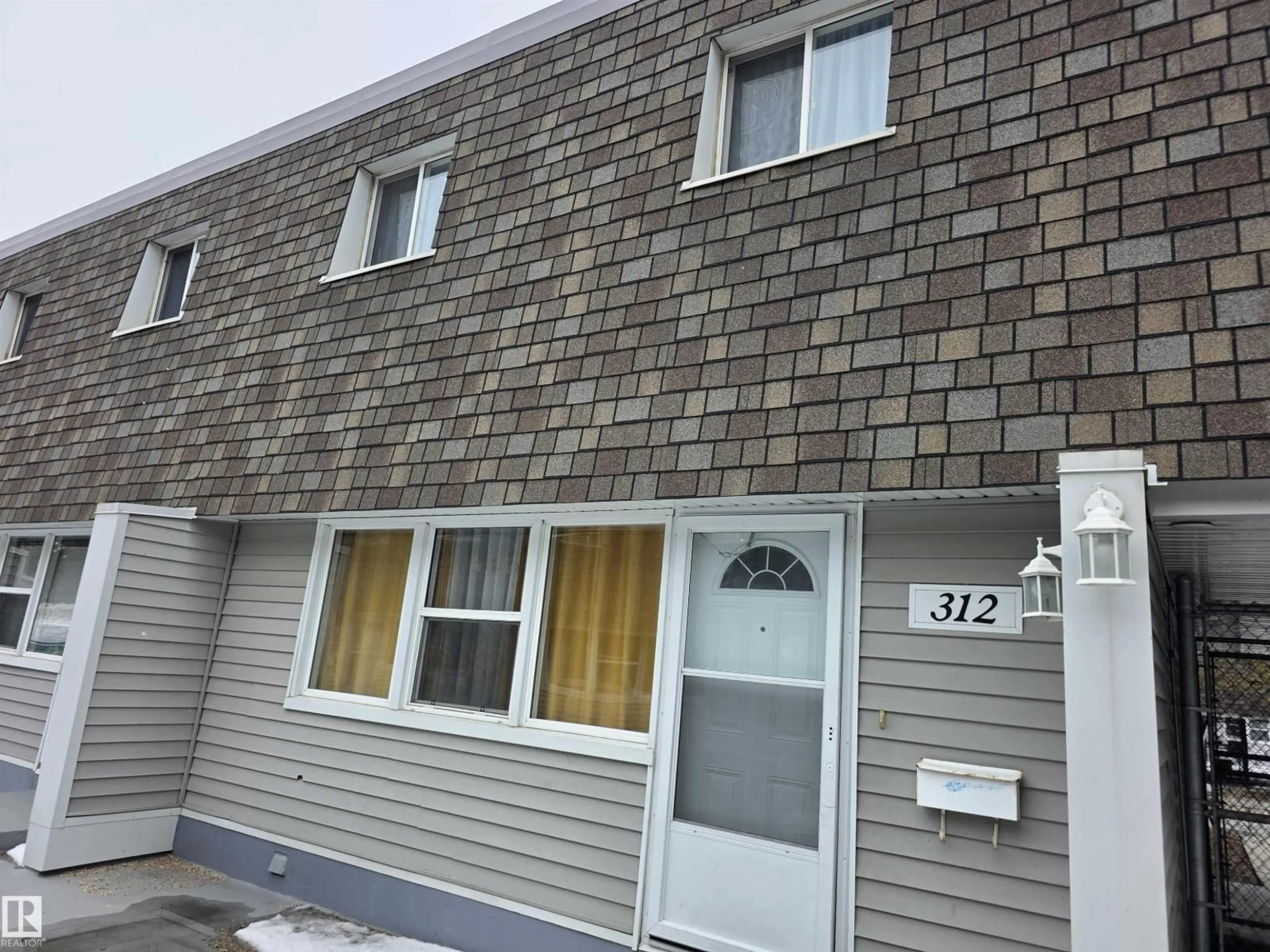 Home with vinyl exterior material, street for NW - 312 VILLAGE ON THE GREEN GR, Edmonton Alberta T5A1H2