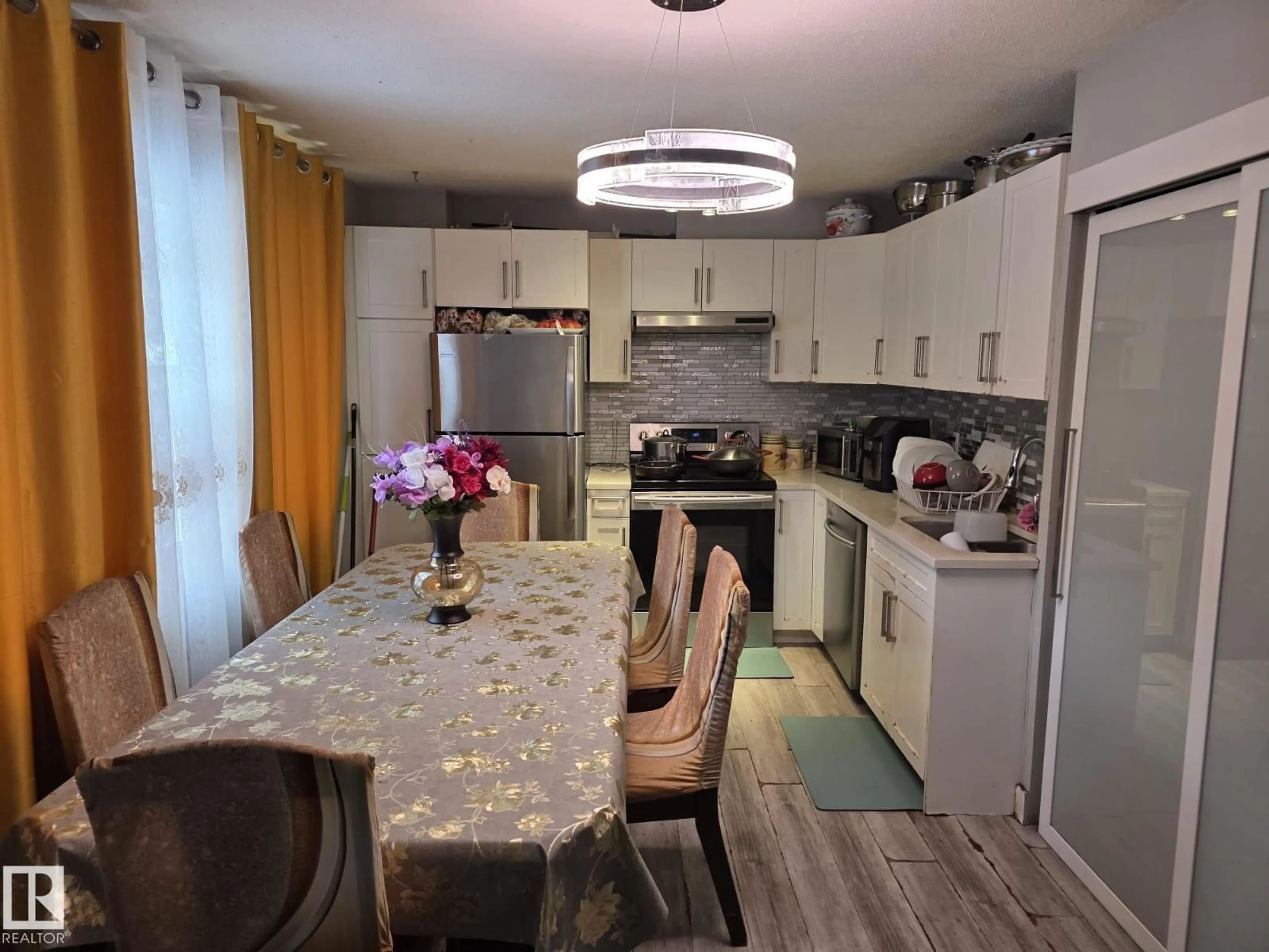 Open concept kitchen, unknown for NW - 312 VILLAGE ON THE GREEN GR, Edmonton Alberta T5A1H2