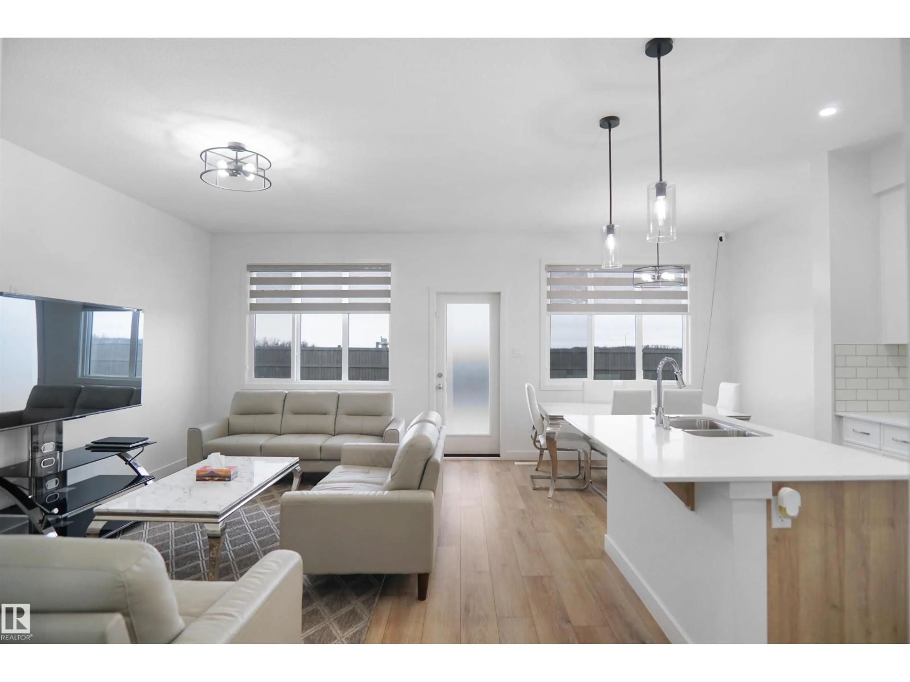 Open concept kitchen, wood/laminate floor for NW - 7216 182 AV, Edmonton Alberta T5Z0L5