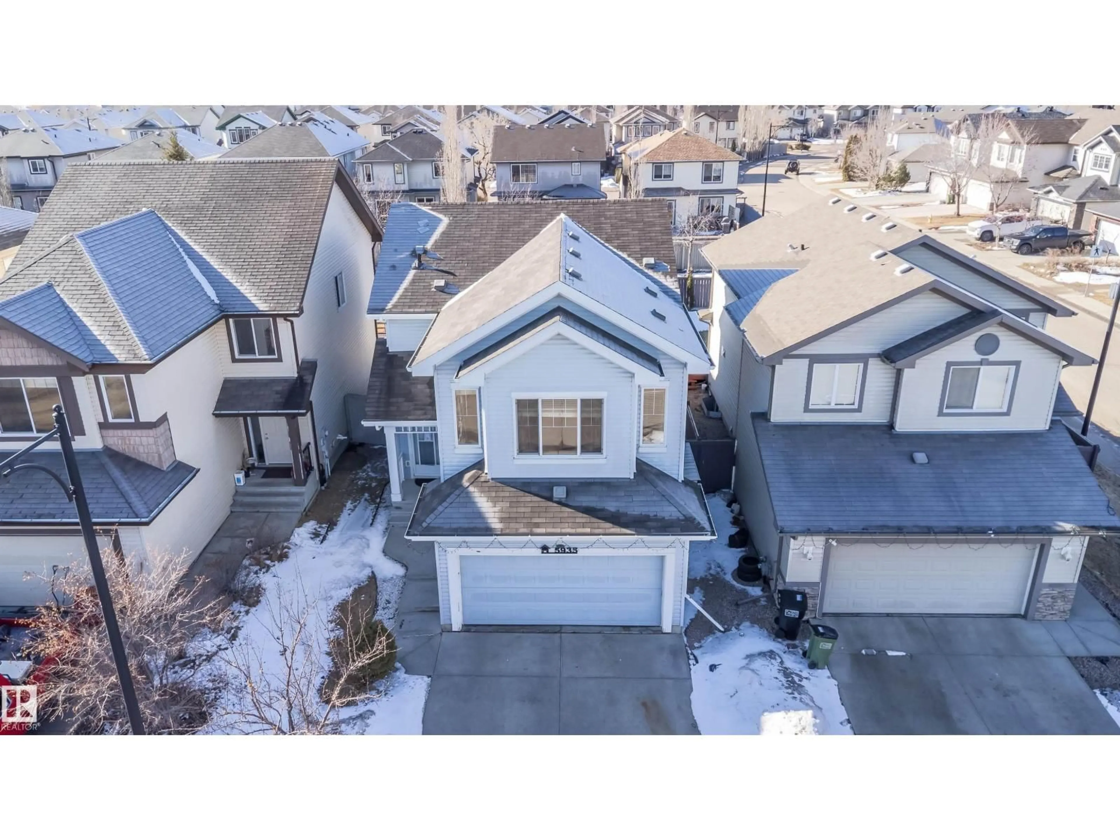 A pic from outside/outdoor area/front of a property/back of a property/a pic from drone, street for 5935 6 AV, Edmonton Alberta T6X0G4