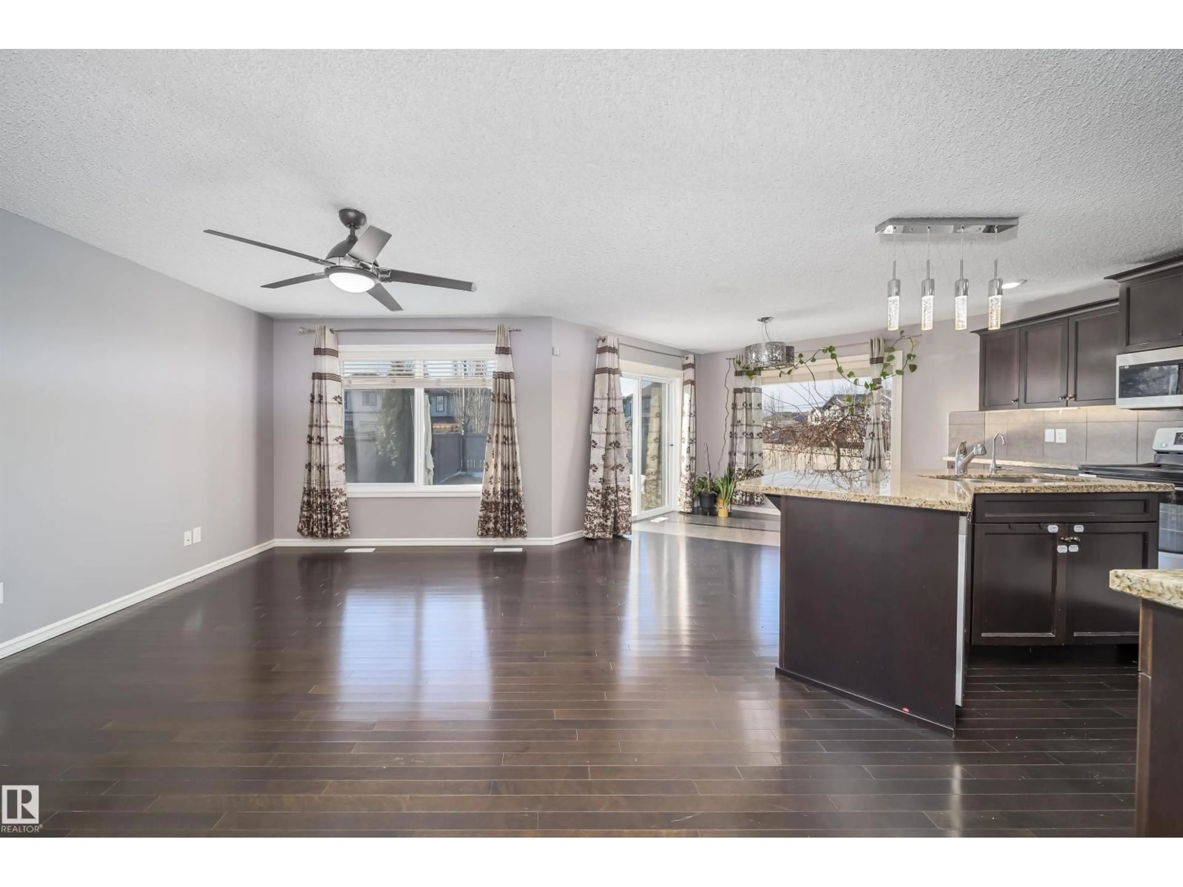 Open concept kitchen, unknown for 5935 6 AV, Edmonton Alberta T6X0G4