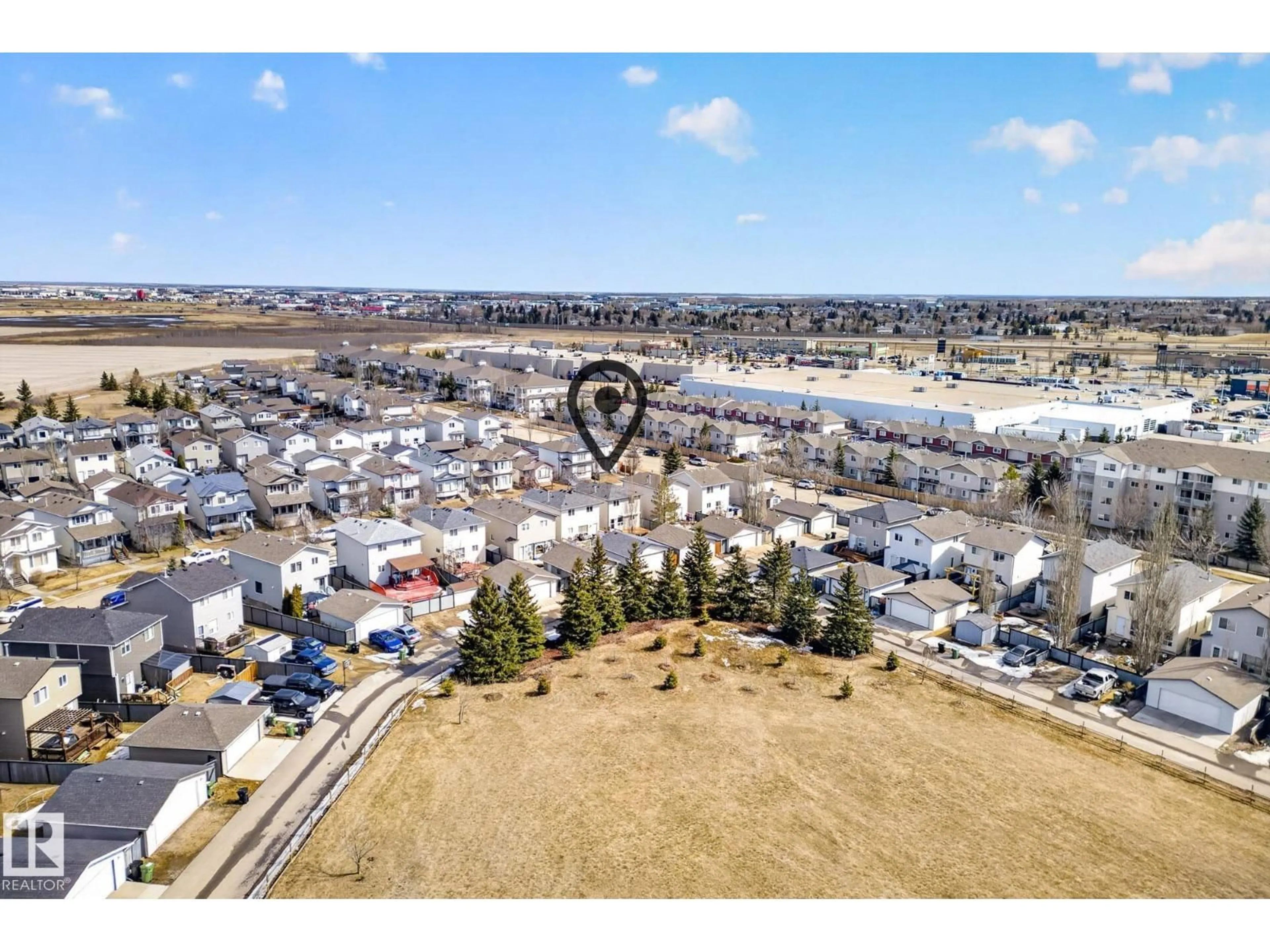 A pic from outside/outdoor area/front of a property/back of a property/a pic from drone, mountain view for 88 BIRCHMONT DR, Leduc Alberta T9E8N6