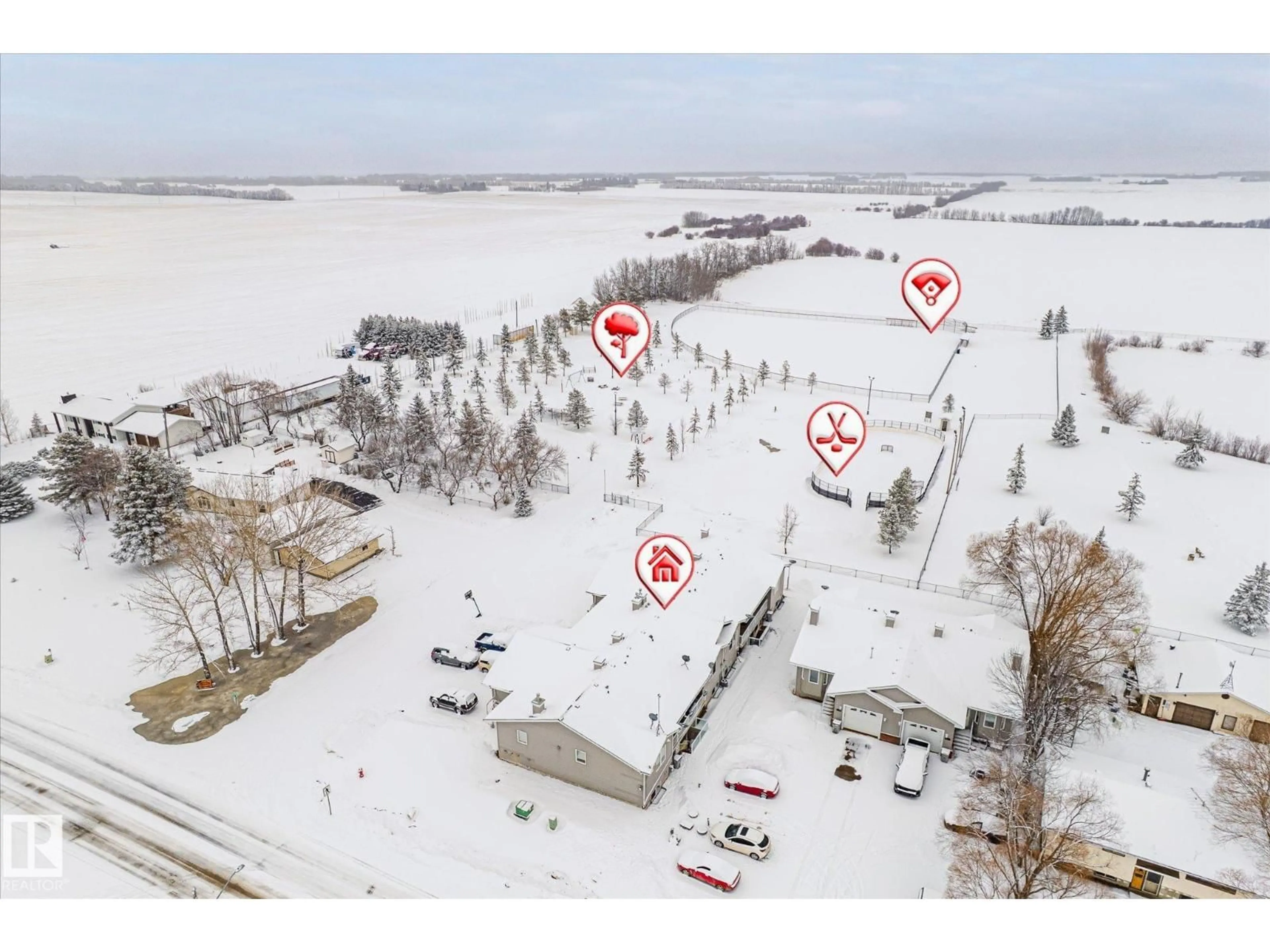 A pic from outside/outdoor area/front of a property/back of a property/a pic from drone, street for 5 - 4902B 43 ST, Legal Alberta T0G1L0
