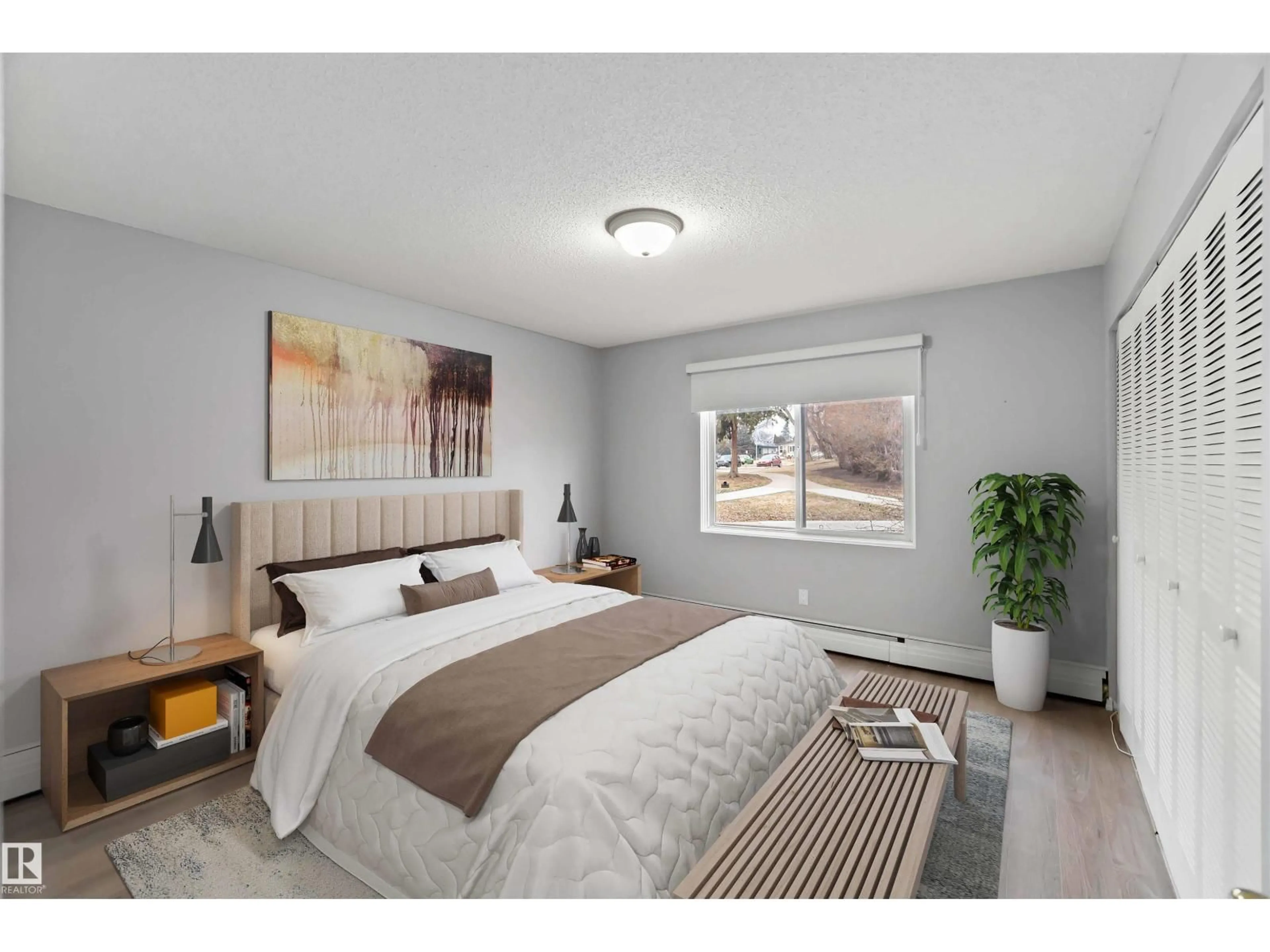 Bedroom with bed, wood/laminate floor for #102 - 11450 40 AV NW, Edmonton Alberta T6J0R5