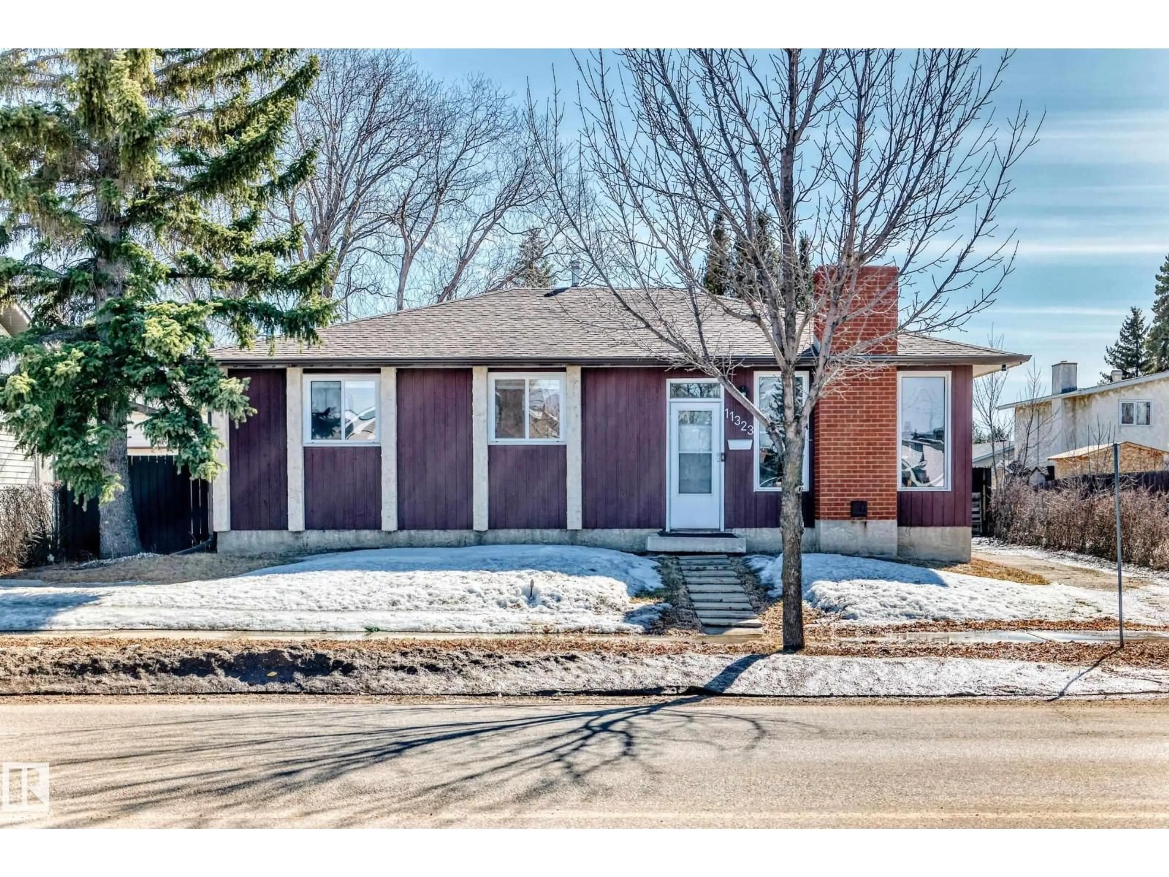 Home with brick exterior material, street for 11323 162 AV, Edmonton Alberta T5X2L3