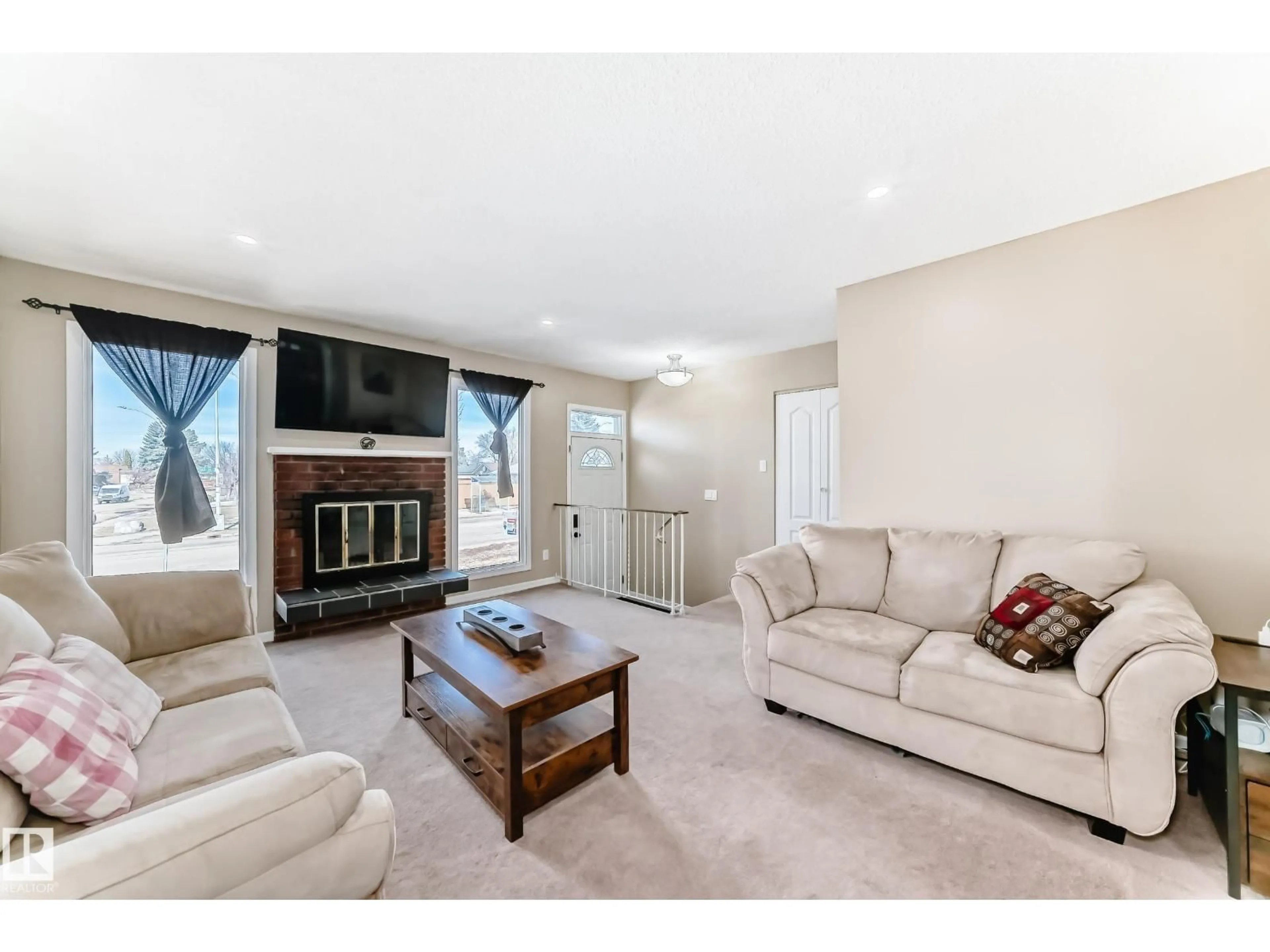 Living room with furniture, unknown for 11323 162 AV, Edmonton Alberta T5X2L3