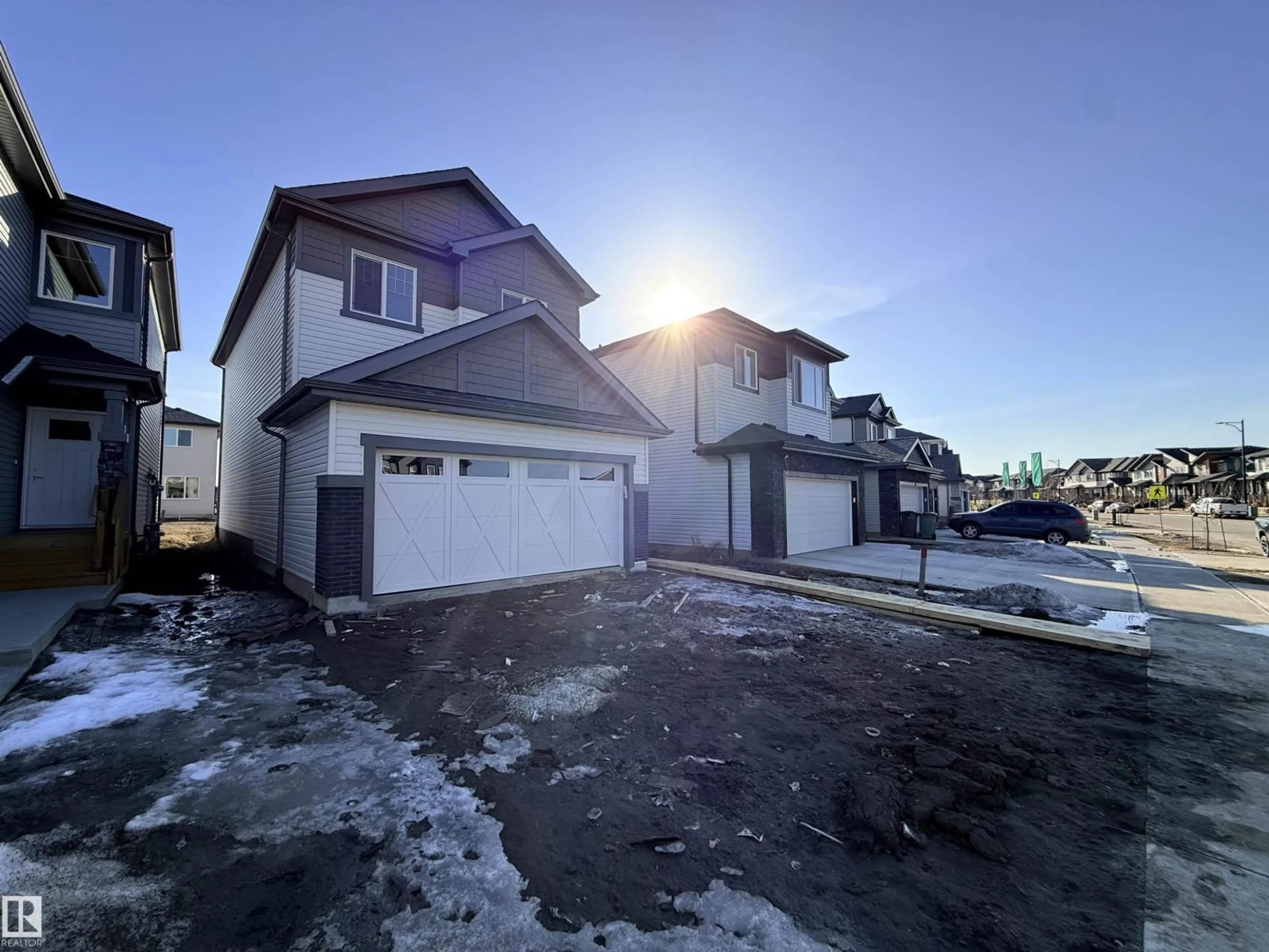 A pic from outside/outdoor area/front of a property/back of a property/a pic from drone, street for 91 DANSEREAU WAY, Beaumont Alberta T6X3E2