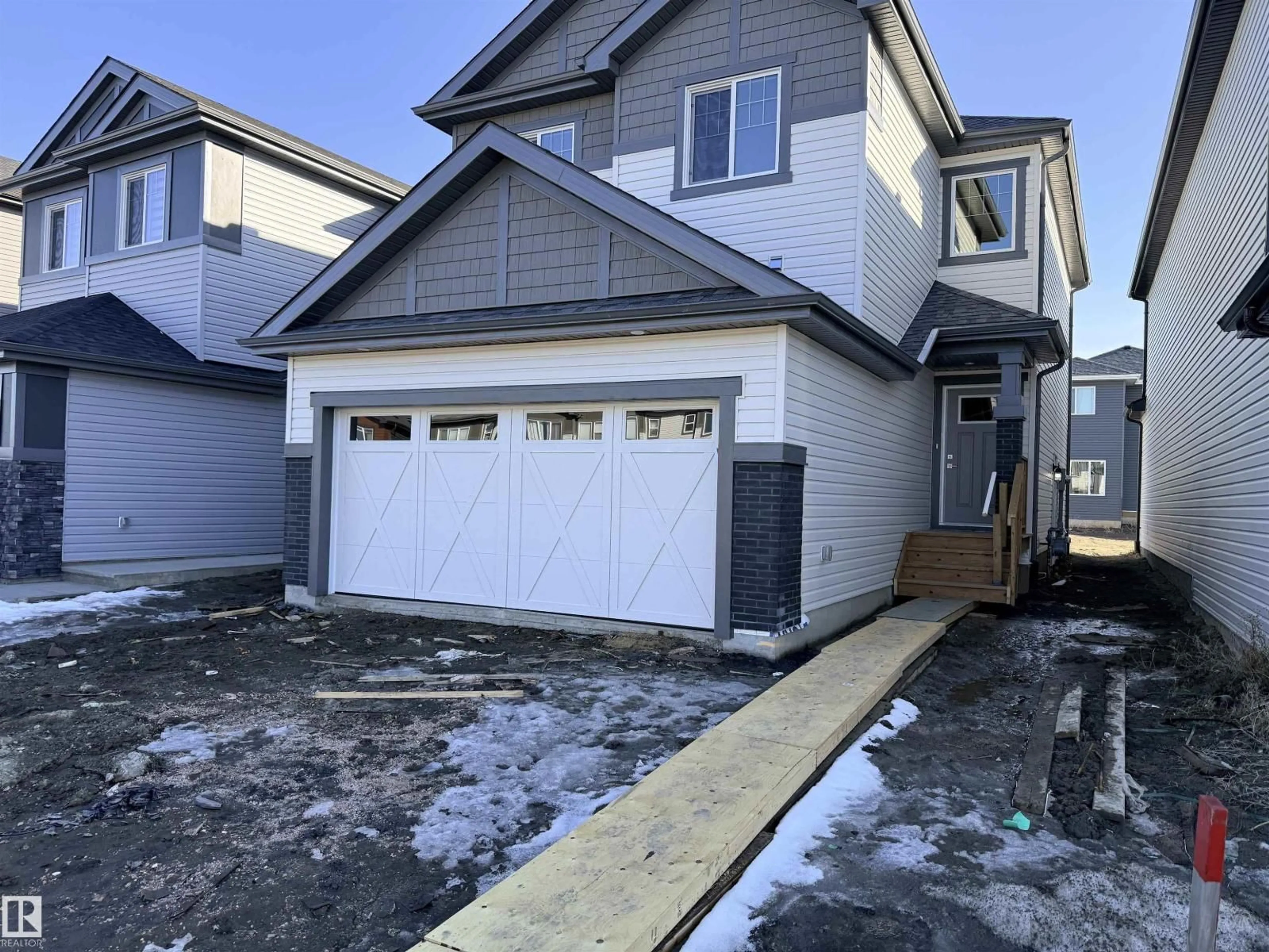Home with vinyl exterior material, street for 91 DANSEREAU WAY, Beaumont Alberta T6X3E2