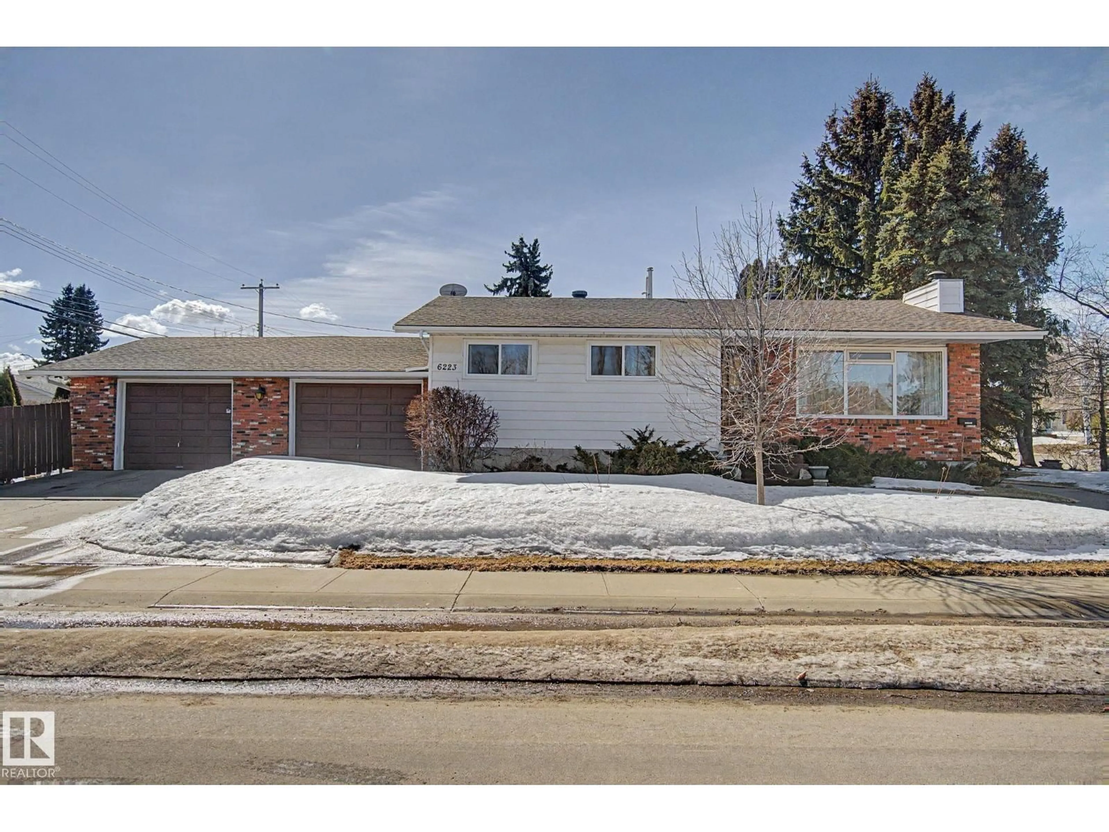 Home with brick exterior material, street for 6223 139 AV, Edmonton Alberta T5A1G2