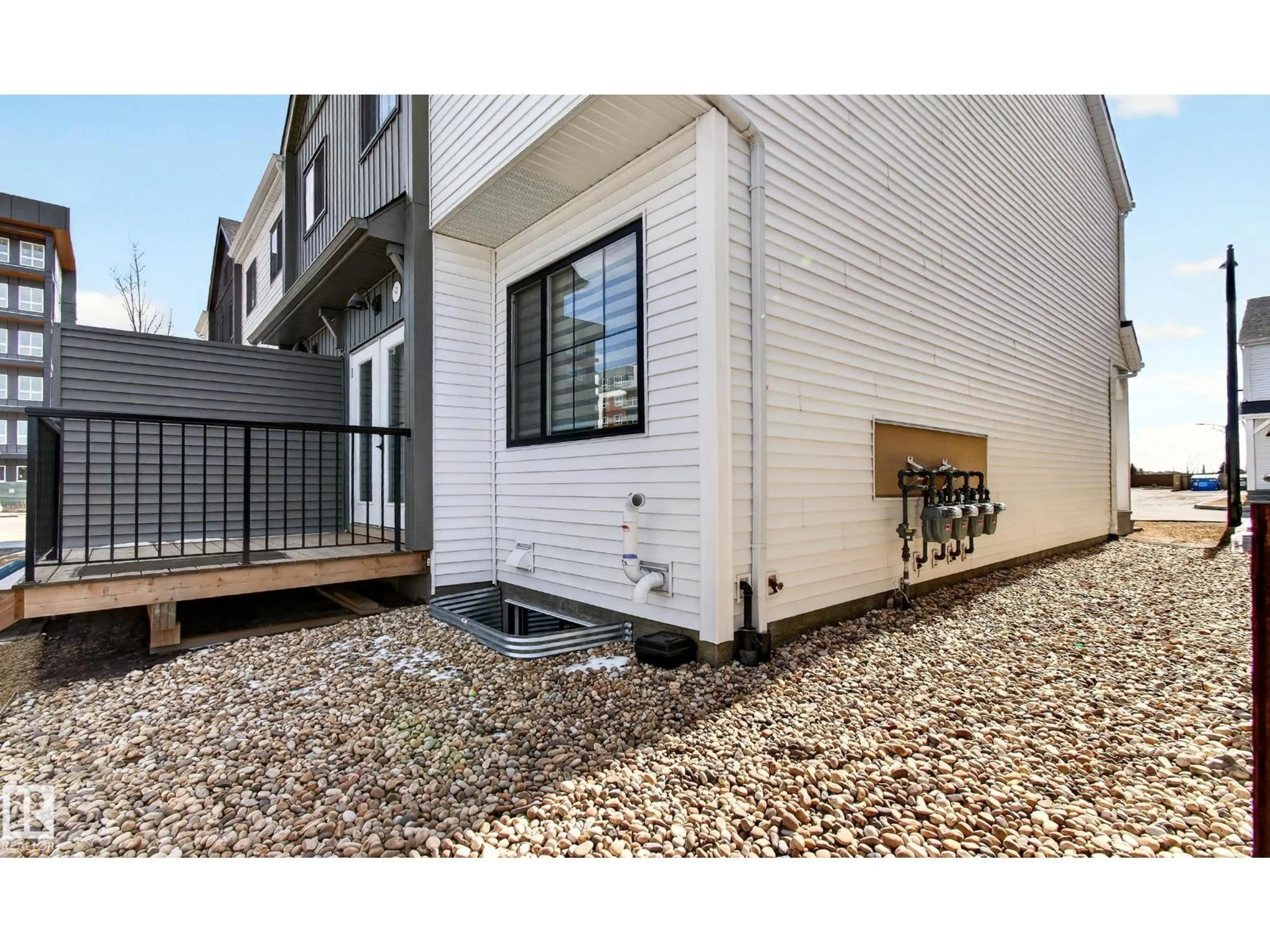 Patio, street for Unit 9 - 1910 COLLIP VIEW SW, Edmonton Alberta T6W5H4