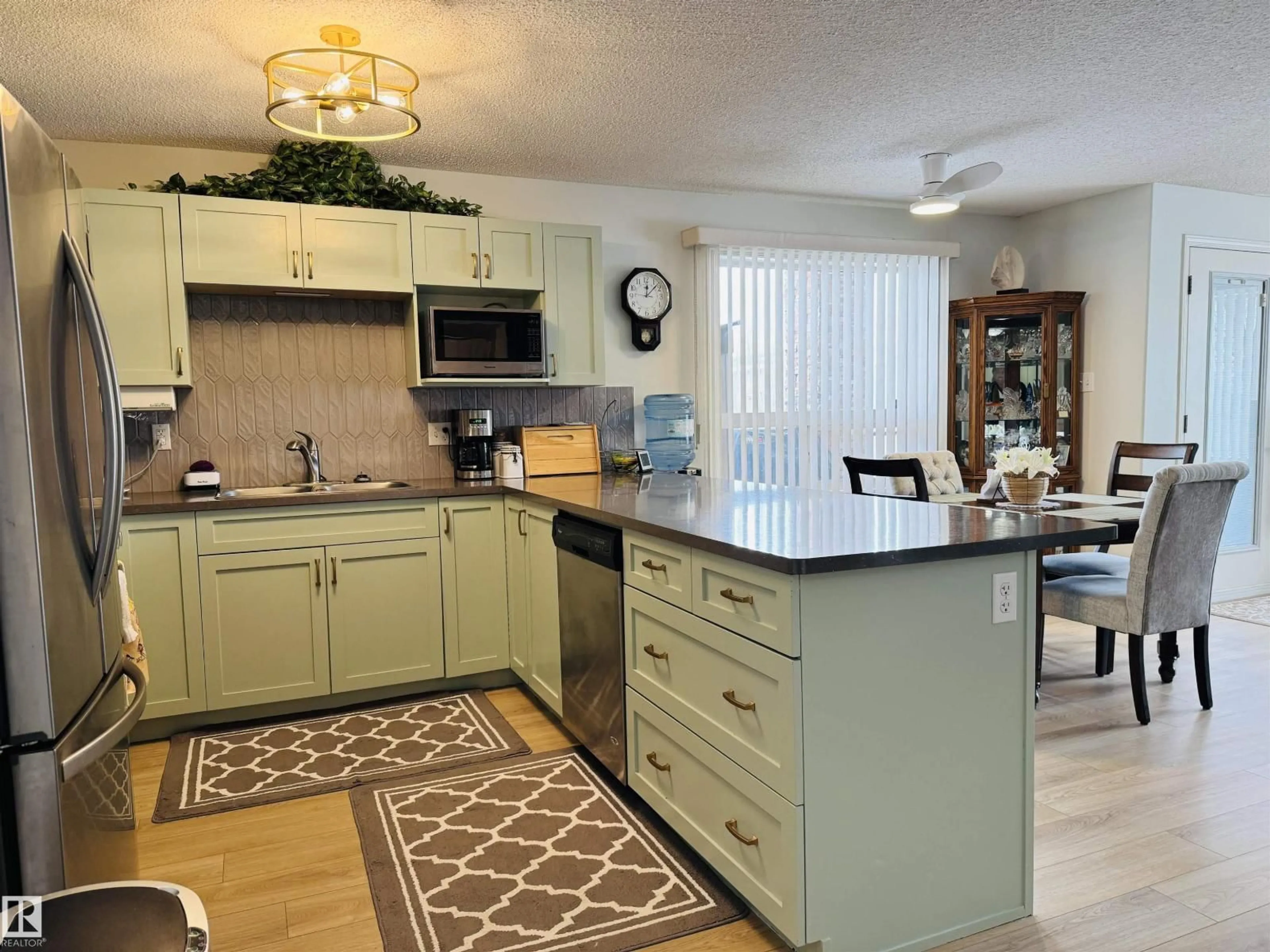 Open concept kitchen, unknown for #107 - 1520 HAMMOND GA, Edmonton Alberta T6M0J4