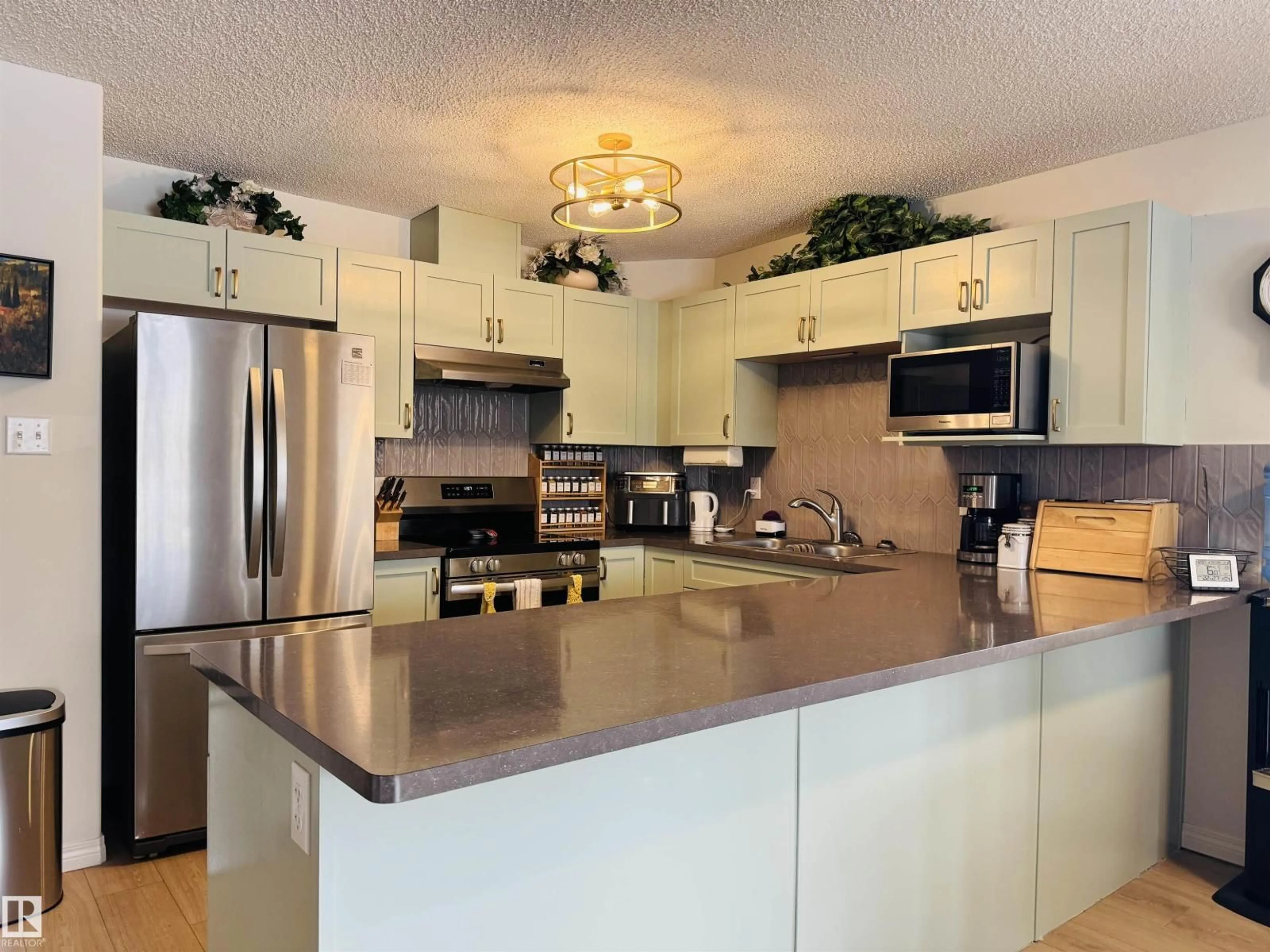 Open concept kitchen, unknown for #107 - 1520 HAMMOND GA, Edmonton Alberta T6M0J4