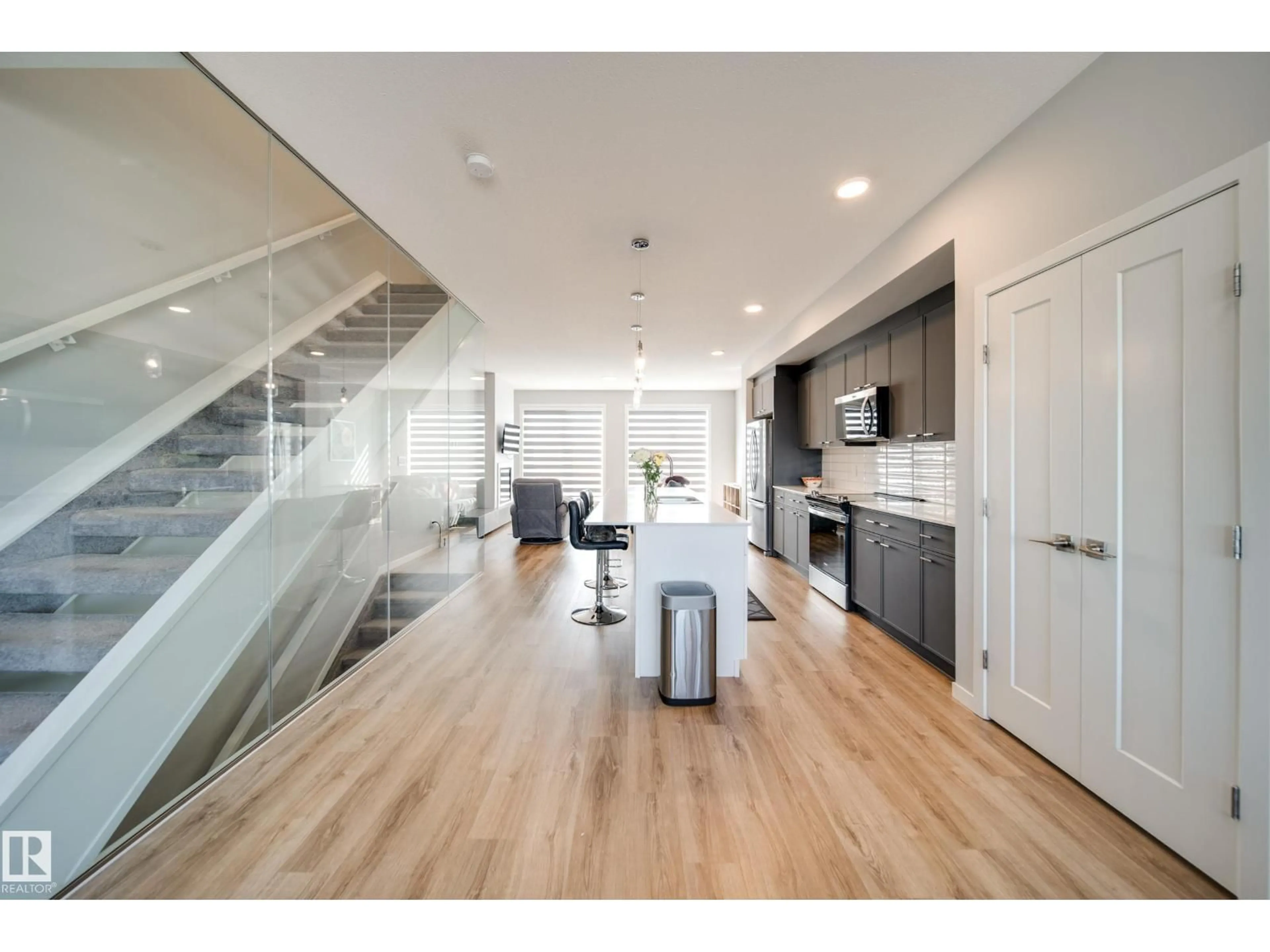 Open concept kitchen, wood/laminate floor for 3330 KULAY WY, Edmonton Alberta T6W5E7