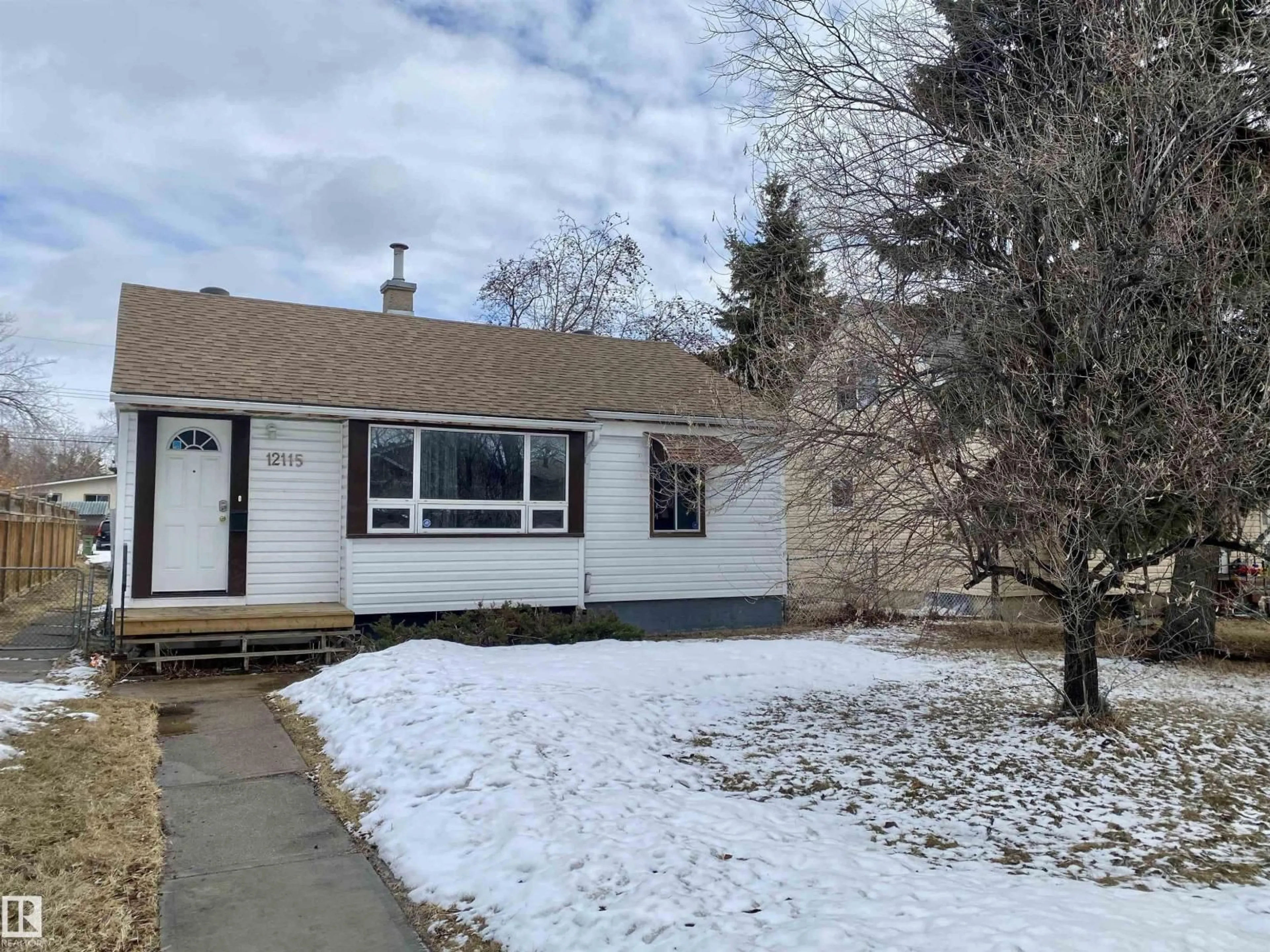 Home with vinyl exterior material, street for NW - 12115 106 ST, Edmonton Alberta T5G2R7