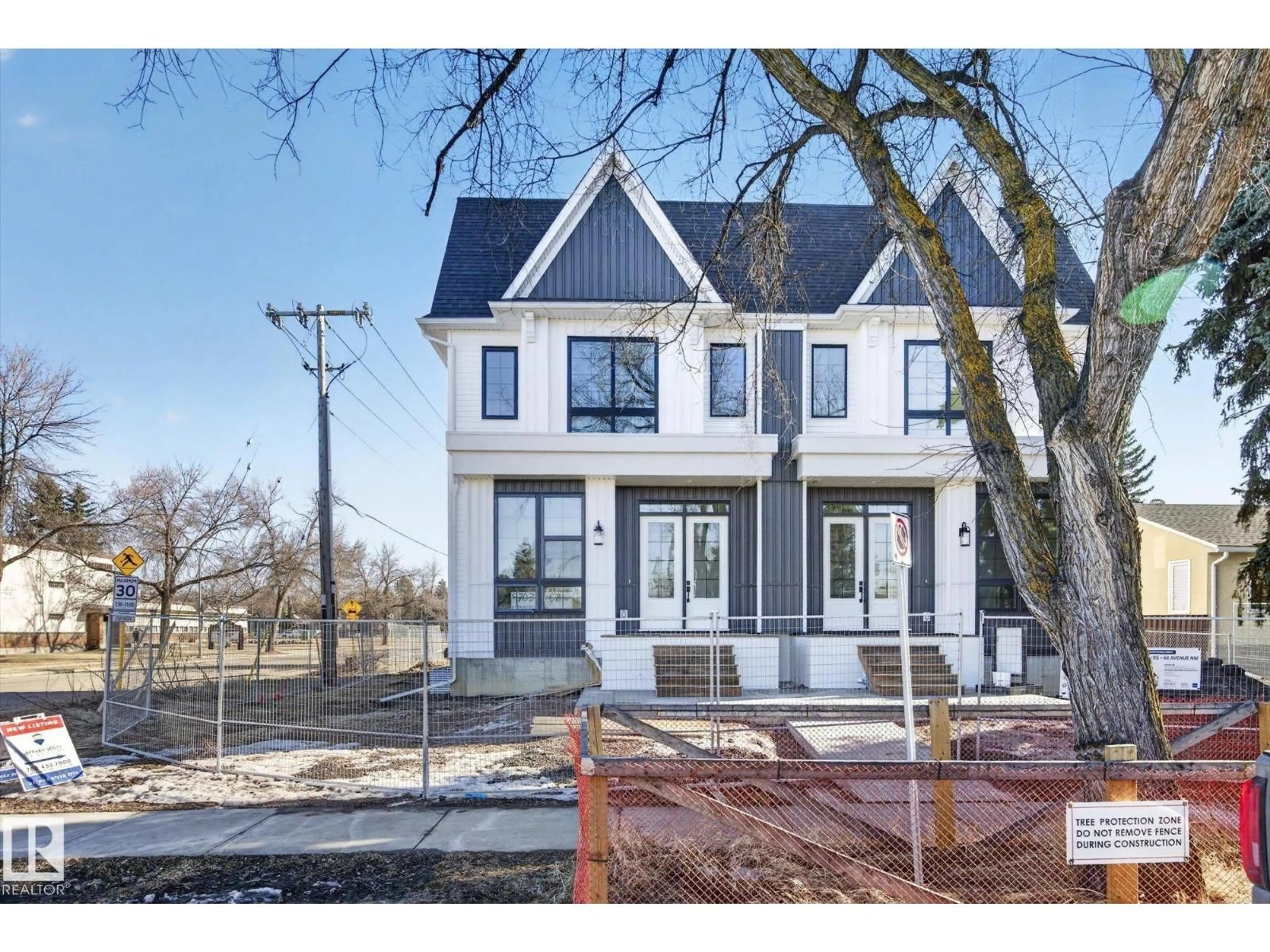 Home with brick exterior material, street for 9705 68 AV, Edmonton Alberta T6E0R3