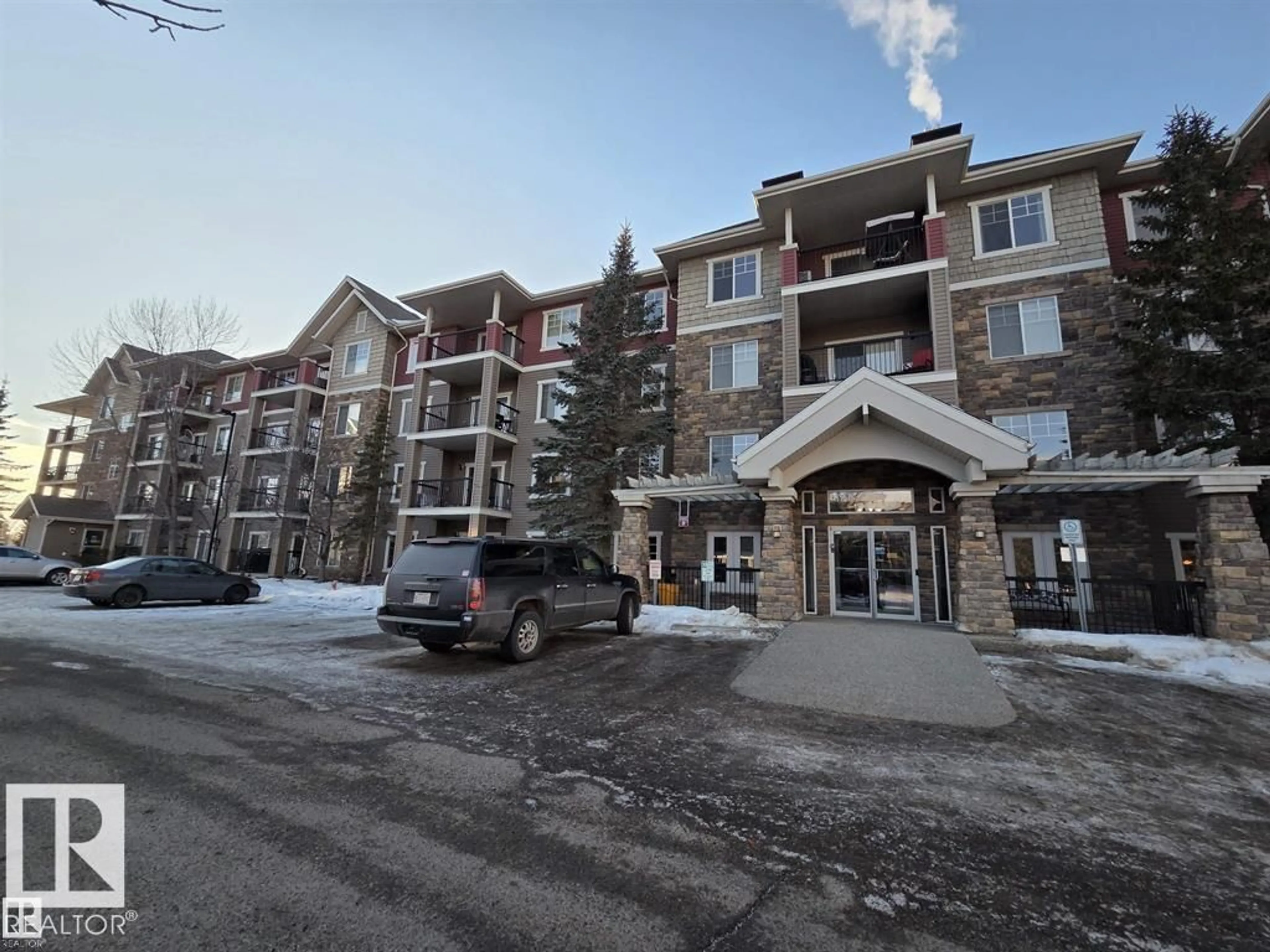 A pic from outside/outdoor area/front of a property/back of a property/a pic from drone, mountain view for 2096 - 239 BLACKMUD CREEK DR, Edmonton Alberta T6W0G1