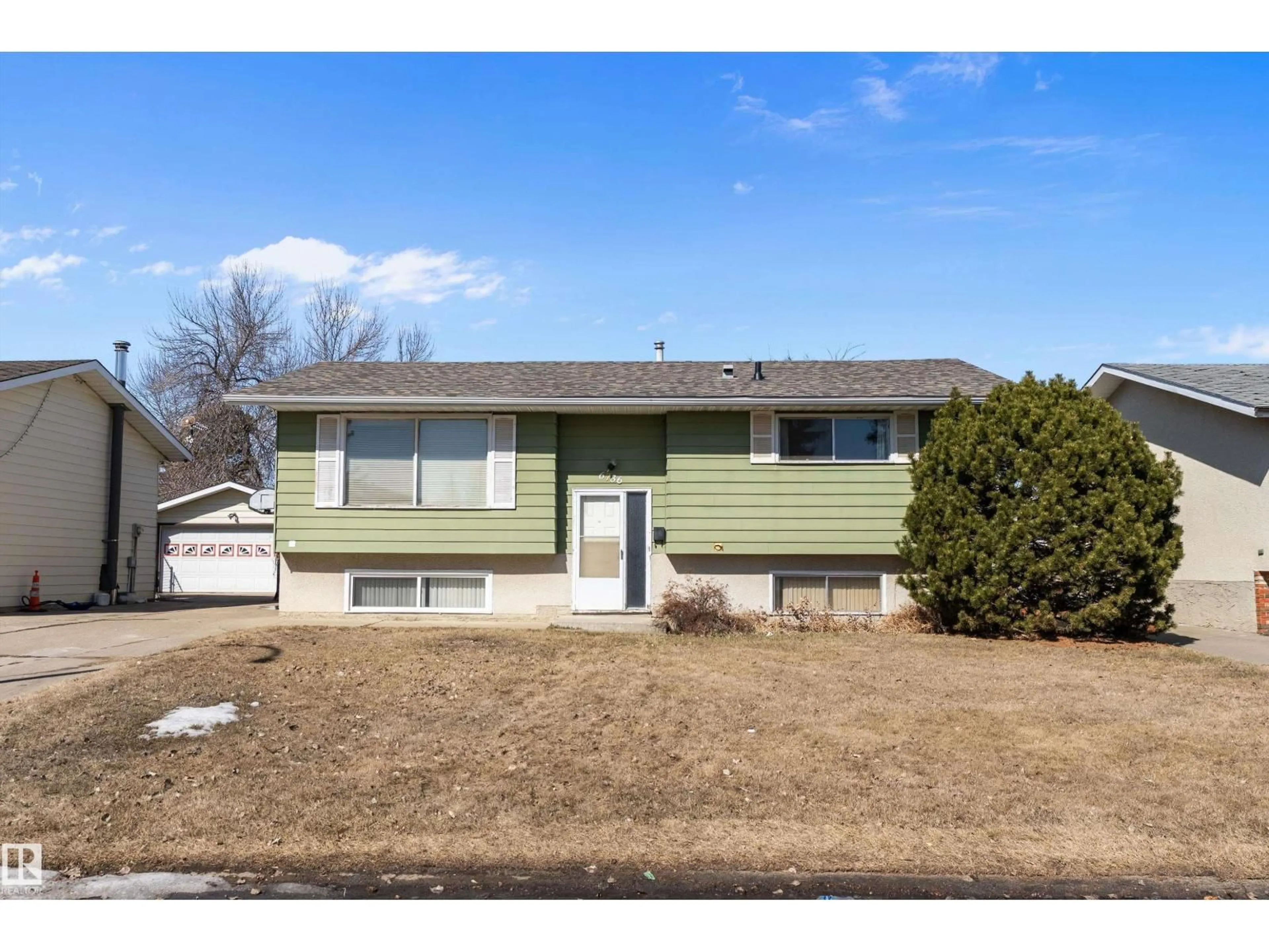 Home with vinyl exterior material, street for 6736 31A AV, Edmonton Alberta T6K1M5