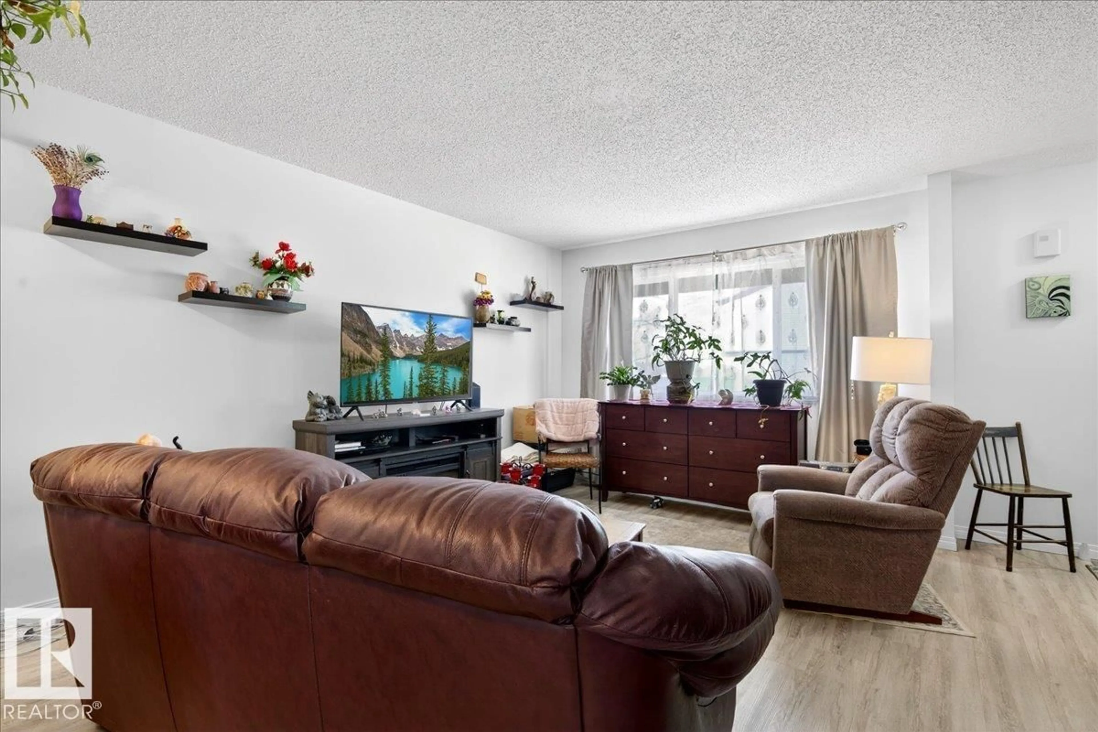 Living room with furniture, wood/laminate floor for #3 - 18010 98 AV, Edmonton Alberta T5T3H6