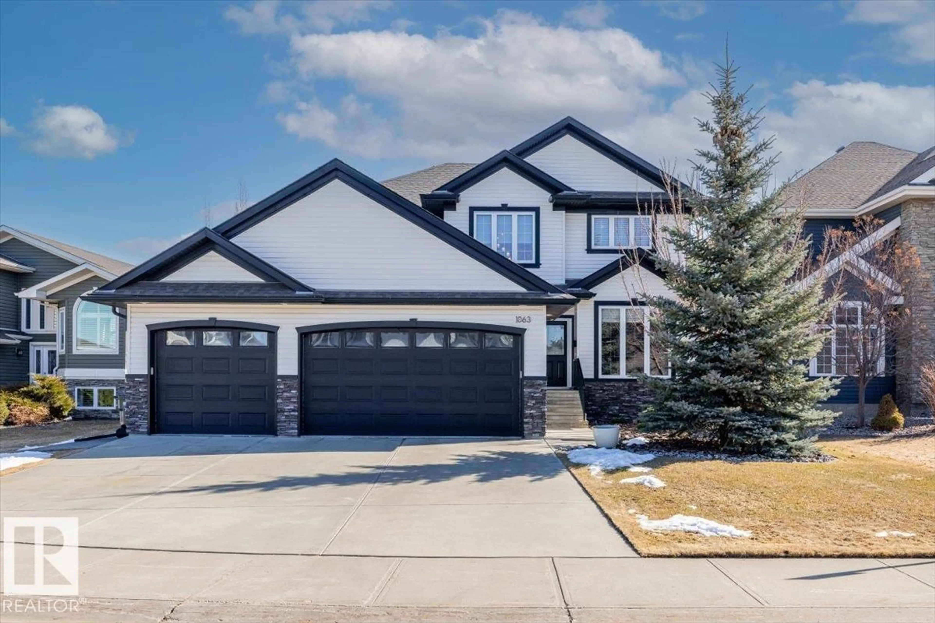 Home with vinyl exterior material, street for 1063 SUMMERWOOD ESTATES RD, Sherwood Park Alberta T8H0E2