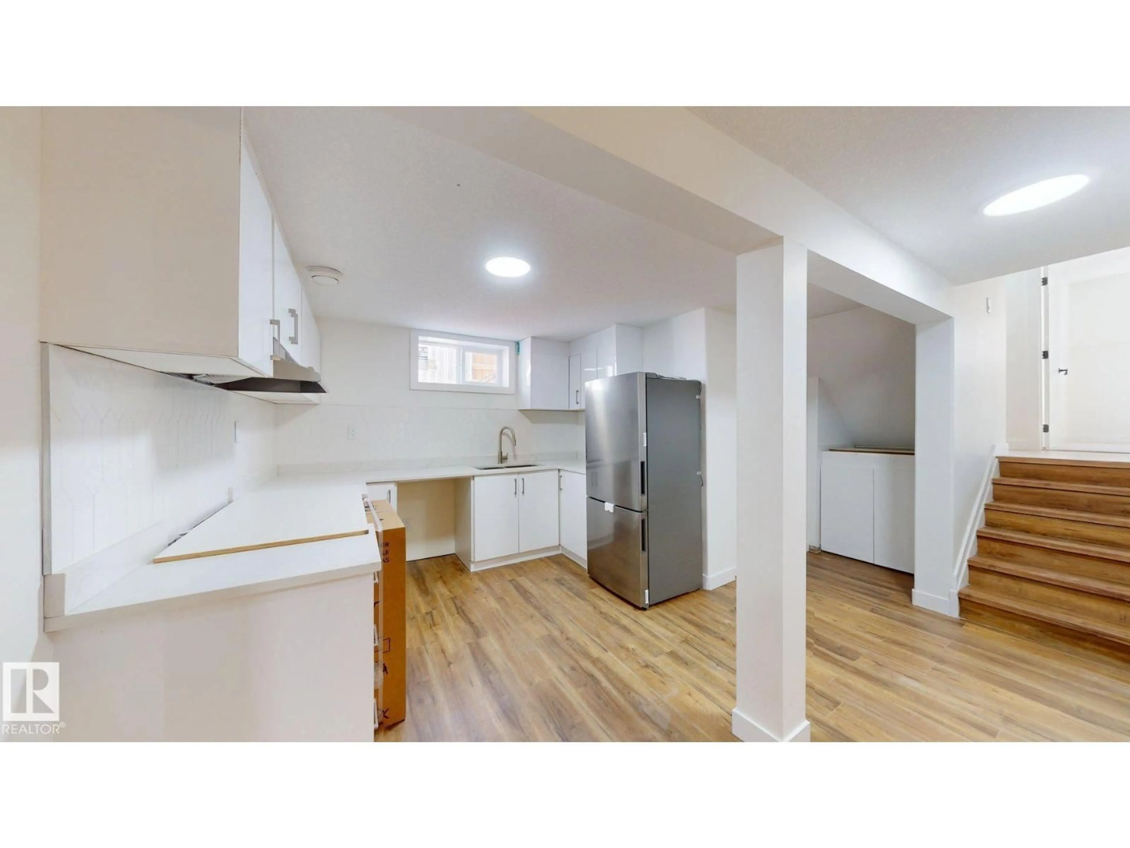 Open concept kitchen, unknown for 8515 86 AV, Edmonton Alberta T6C1J4