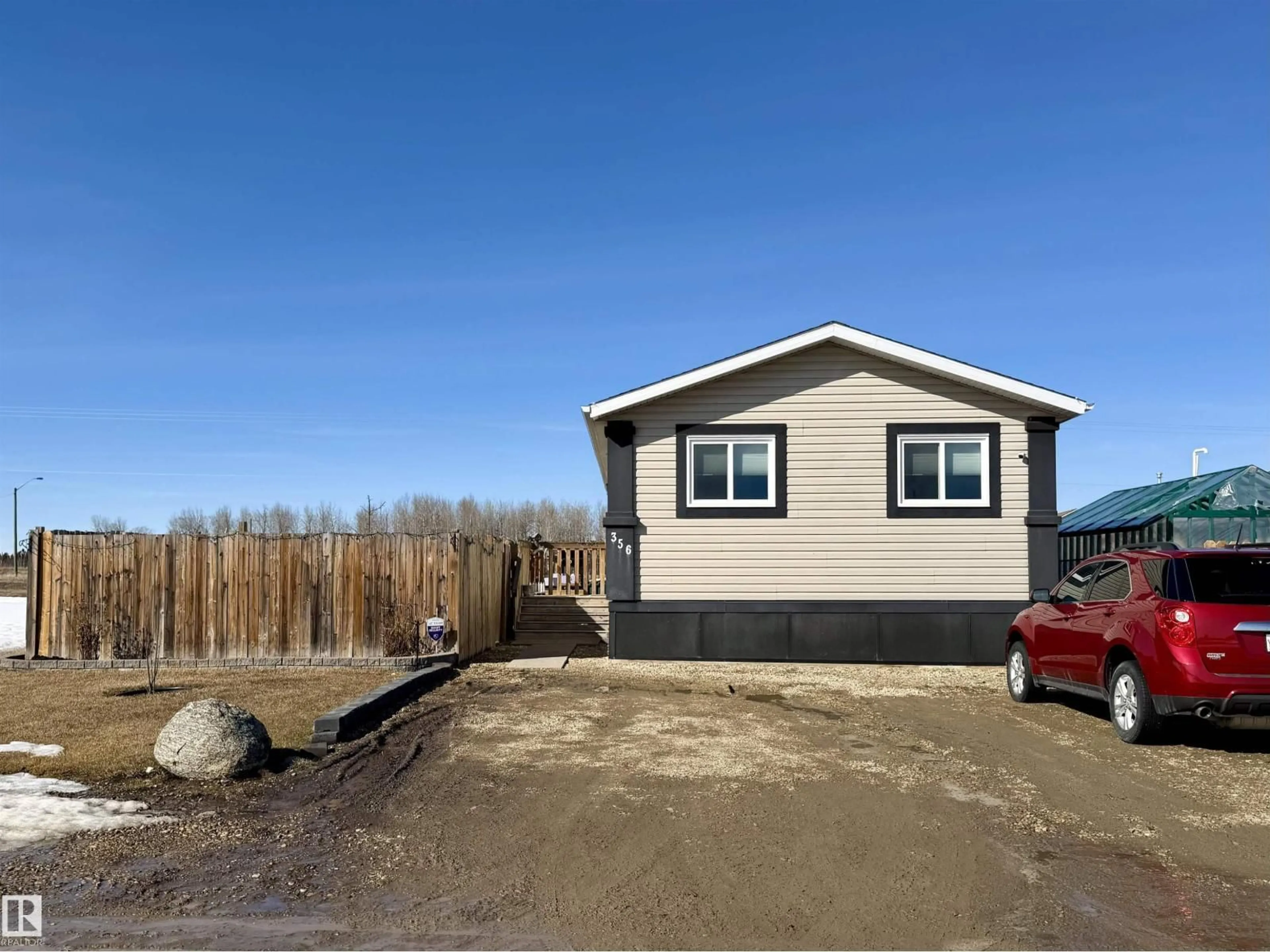 Home with vinyl exterior material, street for 49301 - 356 RANGE ROAD 80, Rural Brazeau County Alberta T7A1L7