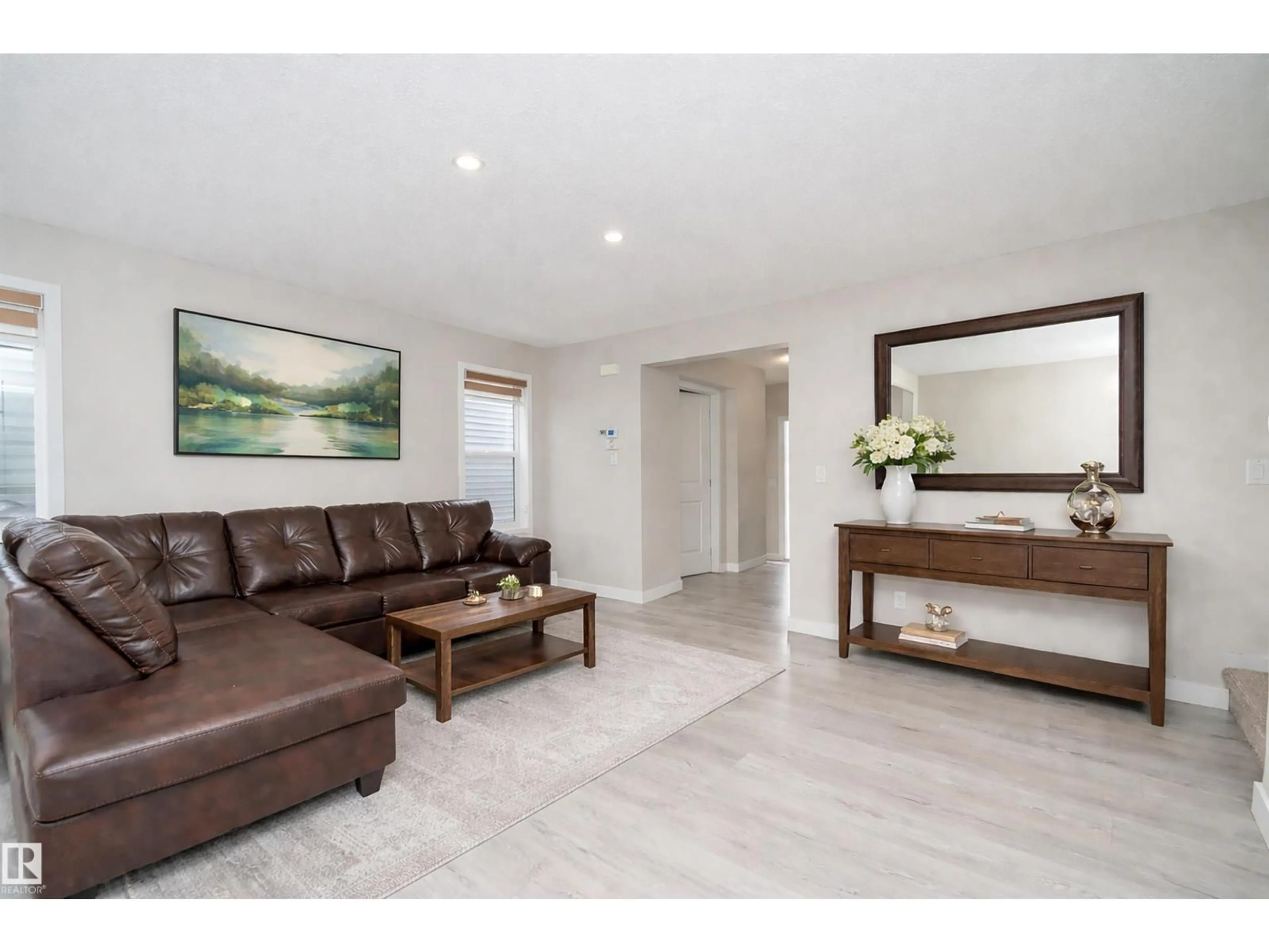 Living room with furniture, wood/laminate floor for SW - 2122 52A ST, Edmonton Alberta T6X1X4