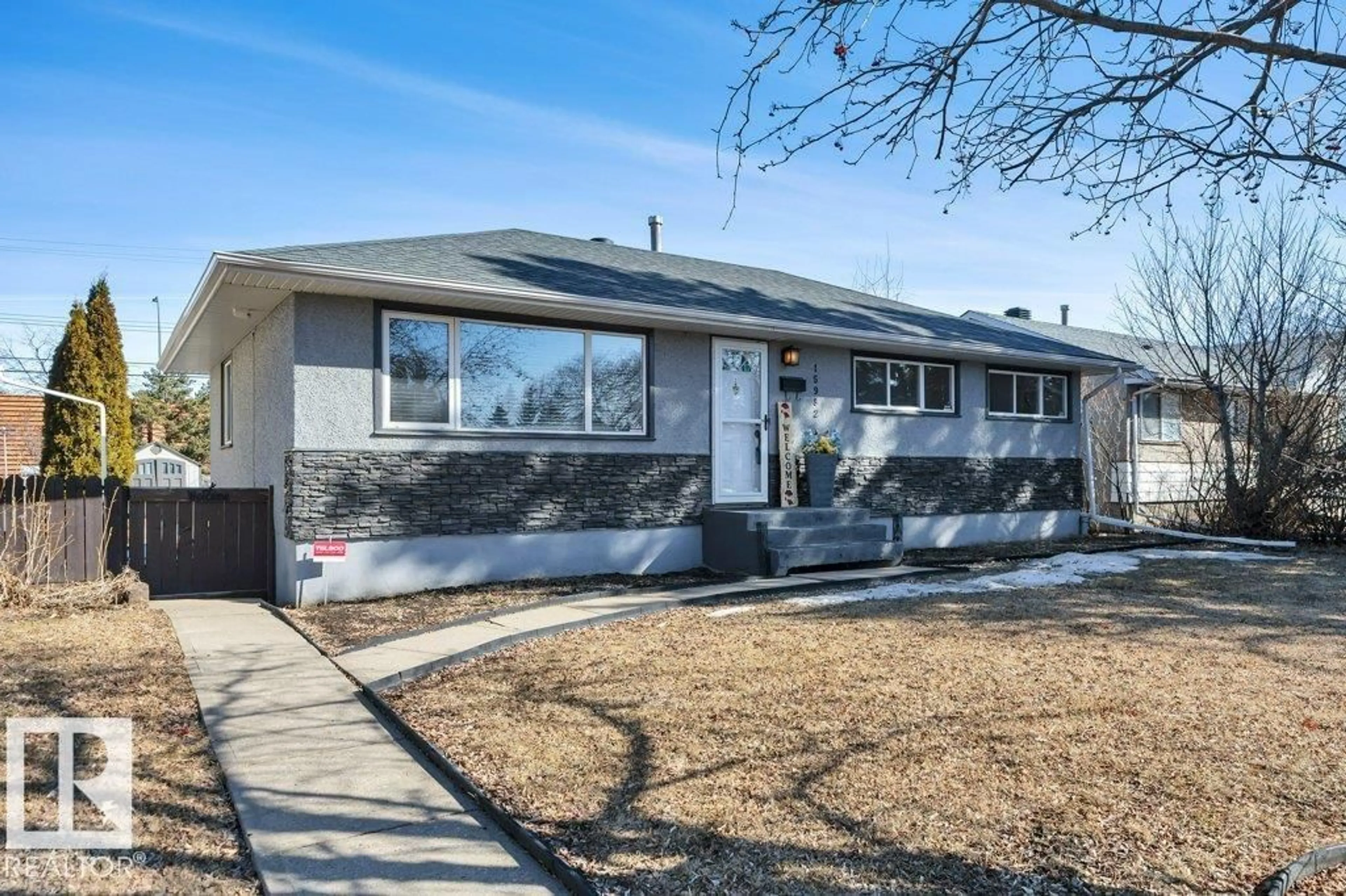 Home with vinyl exterior material, street for NW - 15982 110B AV, Edmonton Alberta T5P1J4