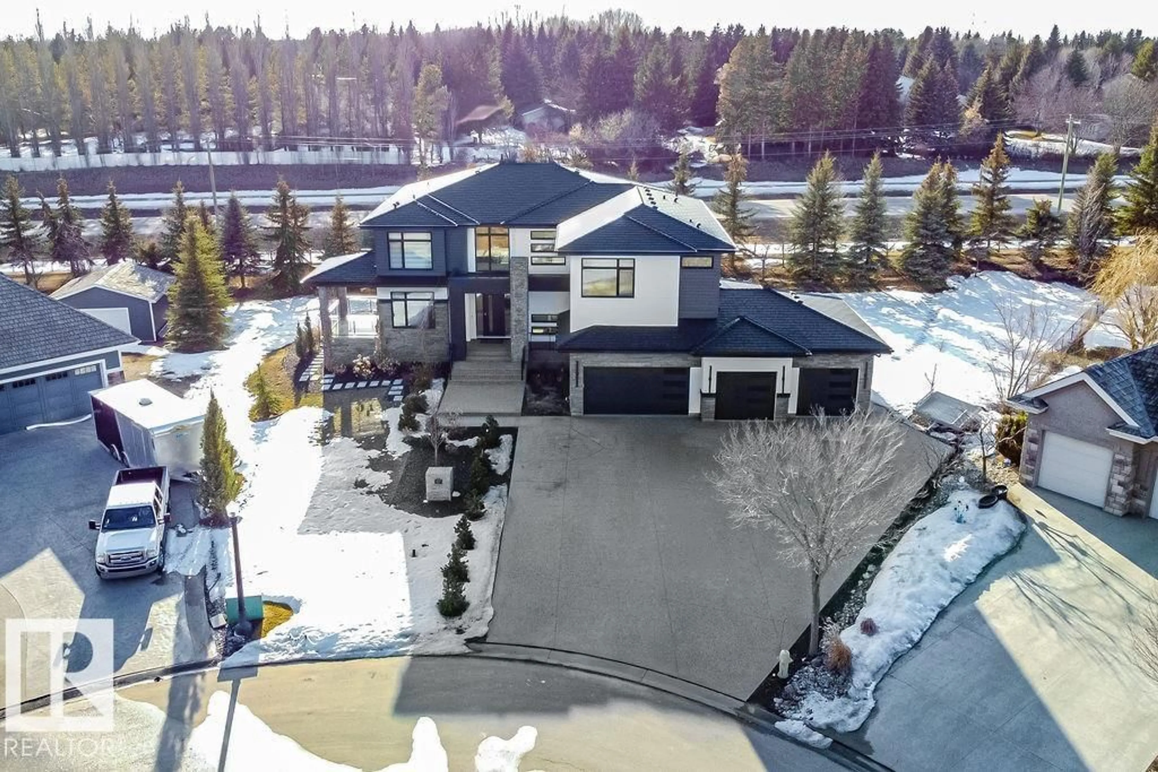 A pic from outside/outdoor area/front of a property/back of a property/a pic from drone, unknown for 97 PINNACLE TC, Rural Sturgeon County Alberta T8T0B5