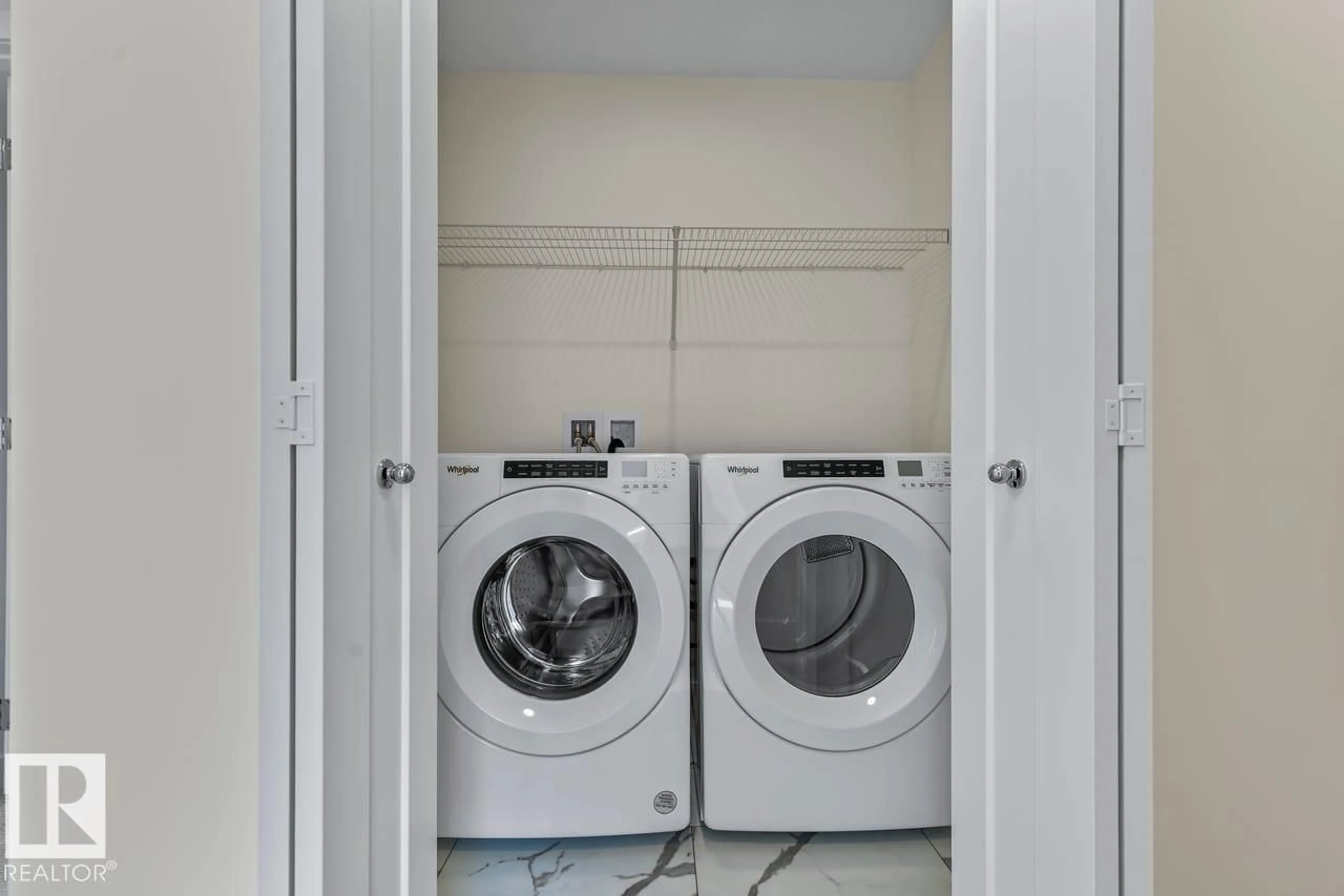 Laundry room for 42 CORNER GLEN MR, Calgary Alberta T3N2R4