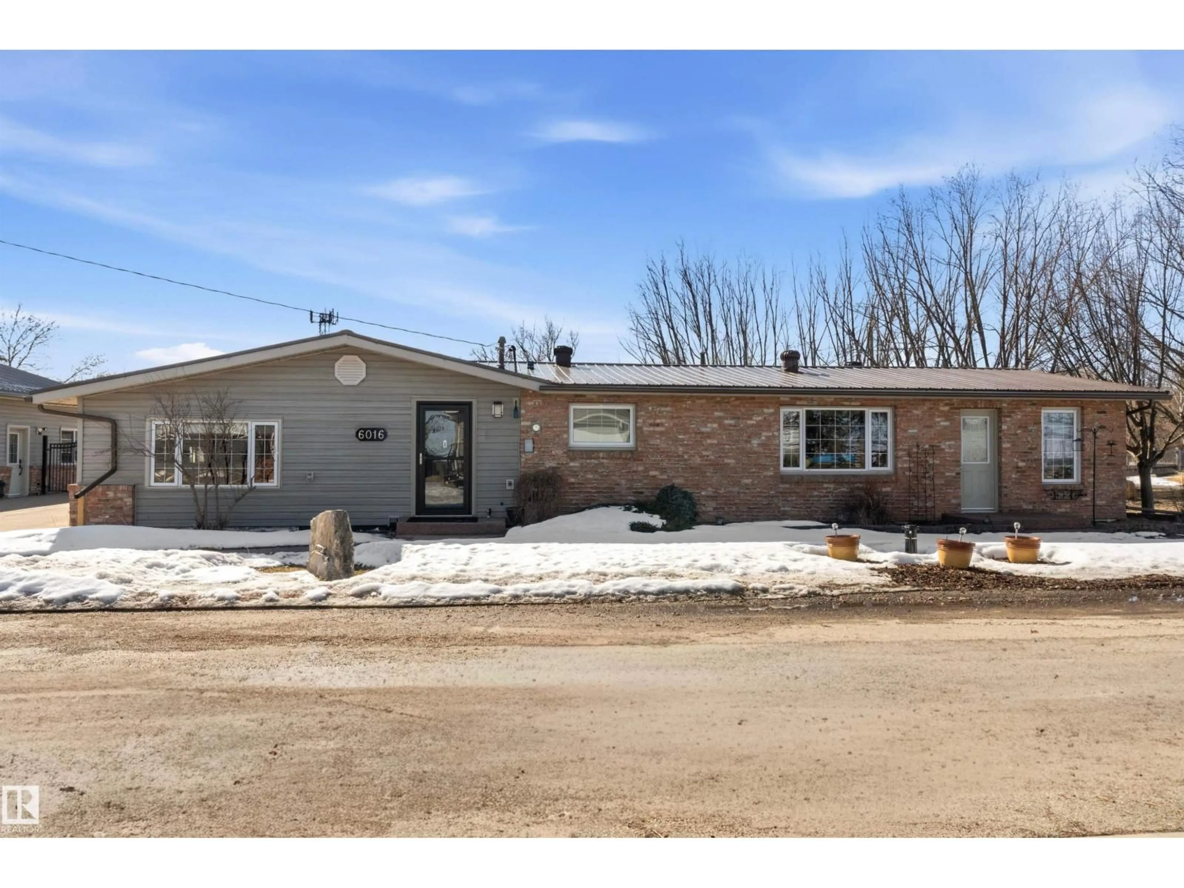Home with brick exterior material, street for 6016 52 AV, Rural Lac Ste. Anne County Alberta T0E0A0