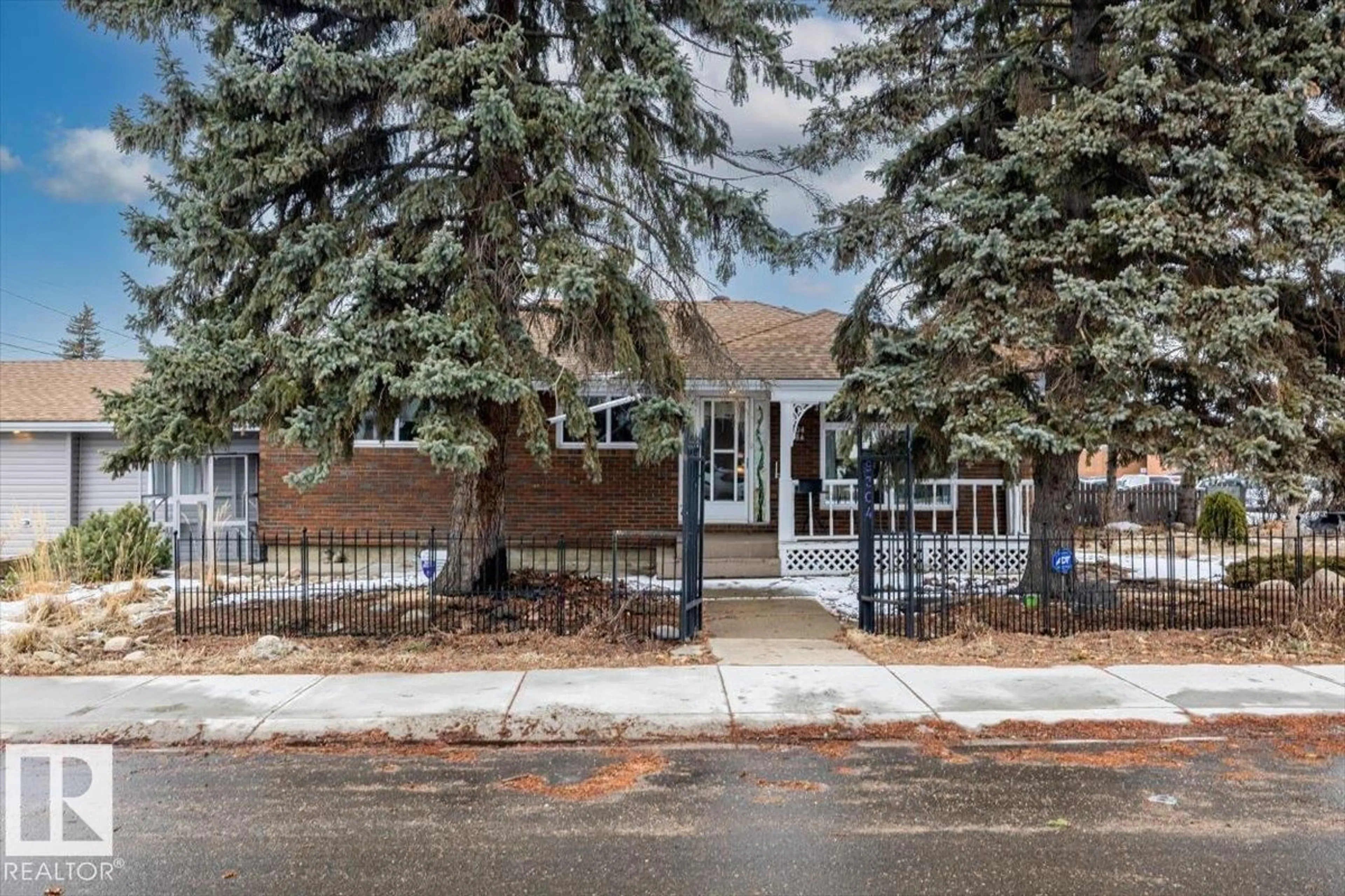Home with brick exterior material, street for 9304 128A AV, Edmonton Alberta T5E0J9