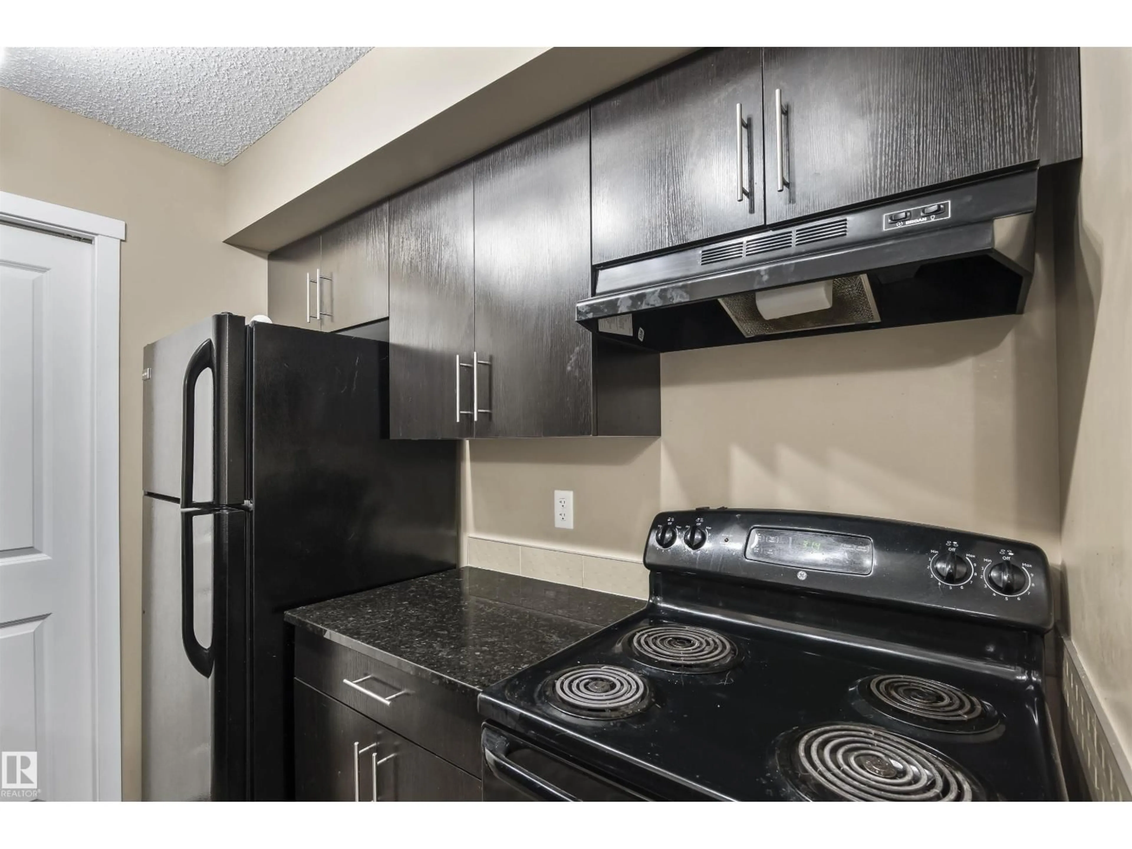 Standard kitchen, unknown for #214 - 5816 MULLEN PL, Edmonton Alberta T6R0W3
