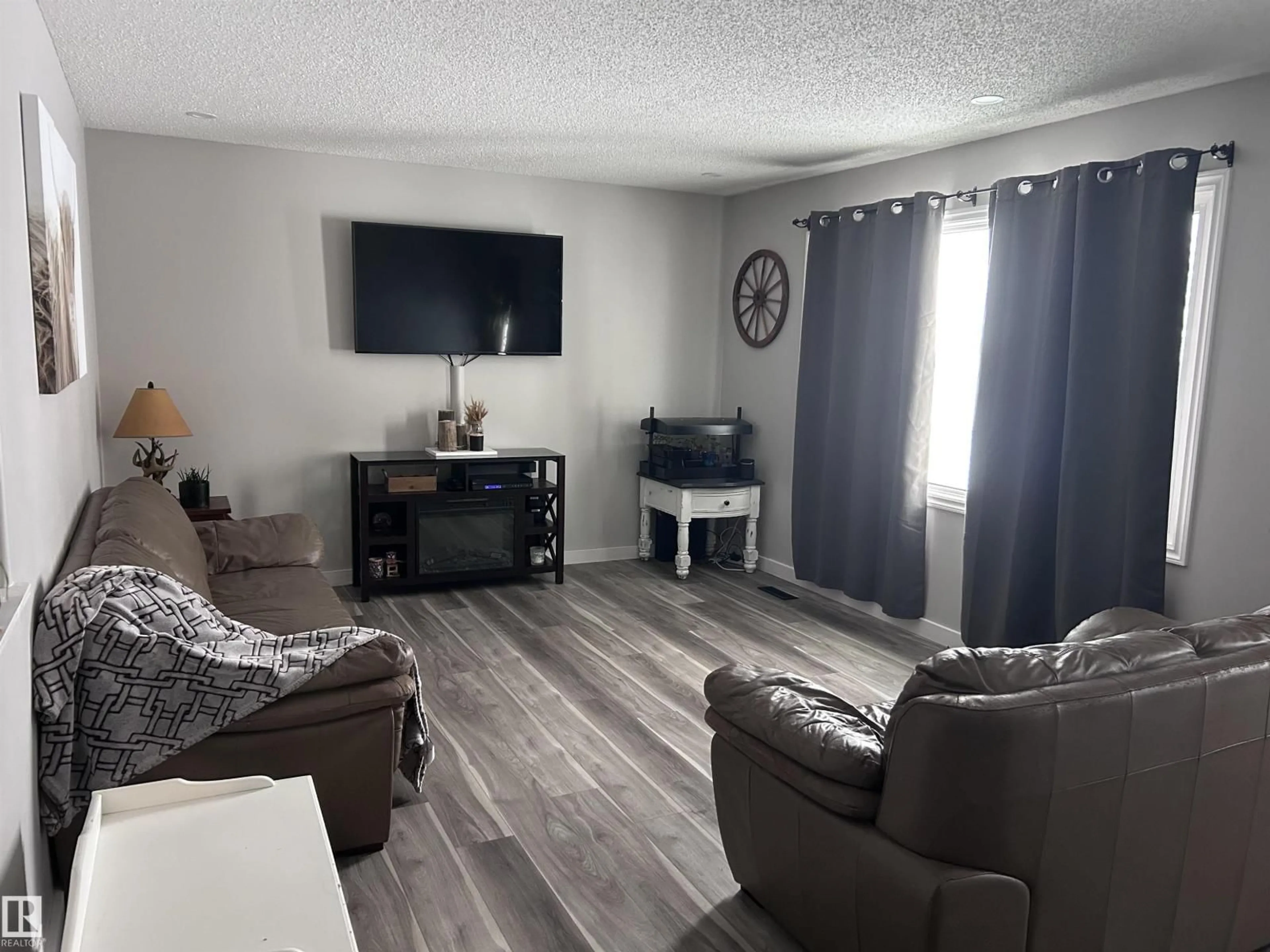 Living room with furniture, unknown for 4515 54 AVE, Tofield Alberta T0B4J0