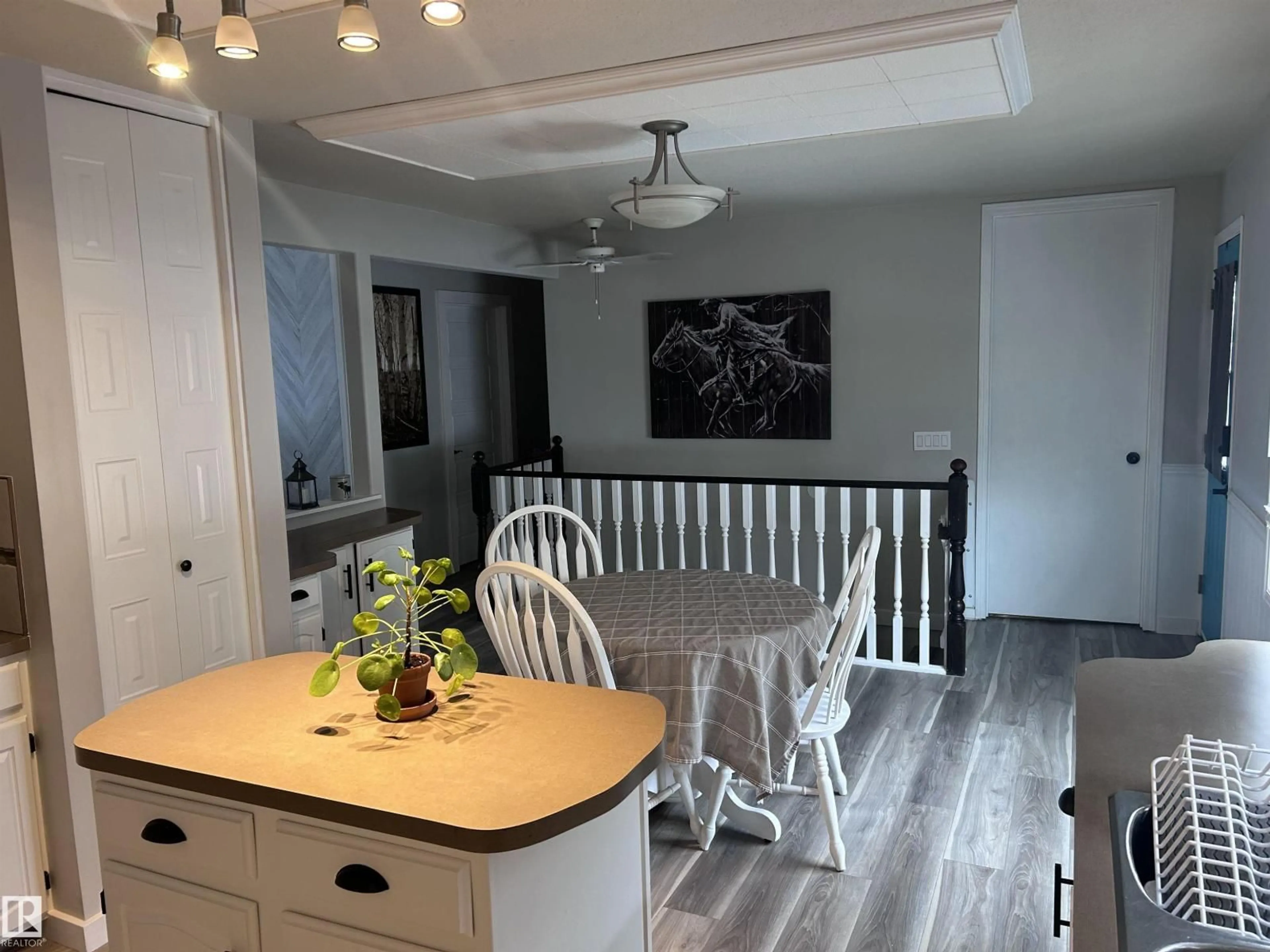 Open concept kitchen, wood/laminate floor for 4515 54 AVE, Tofield Alberta T0B4J0