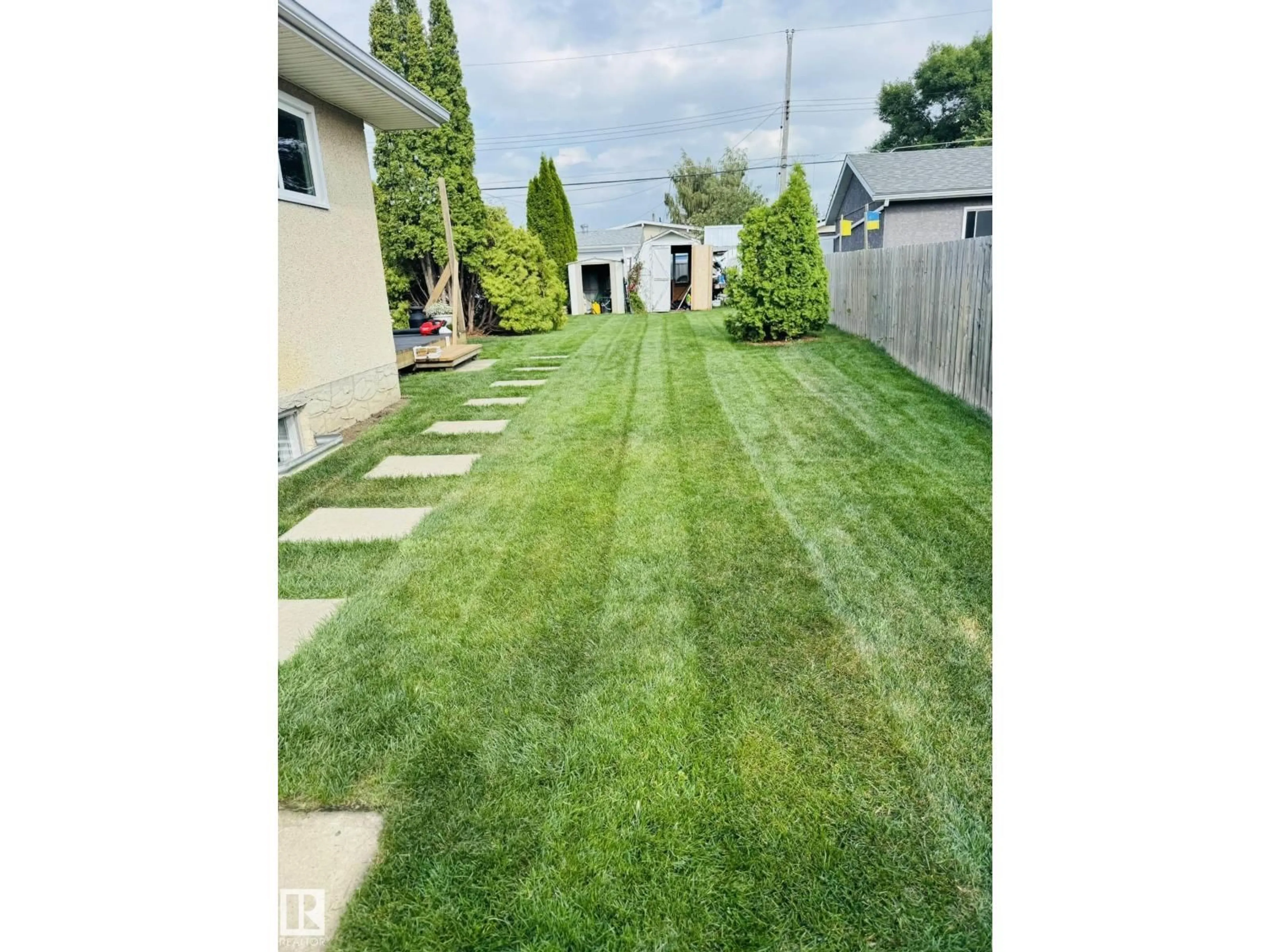 A pic from outside/outdoor area/front of a property/back of a property/a pic from drone, street for 10631 105 STREET, Westlock Alberta T7P1M7