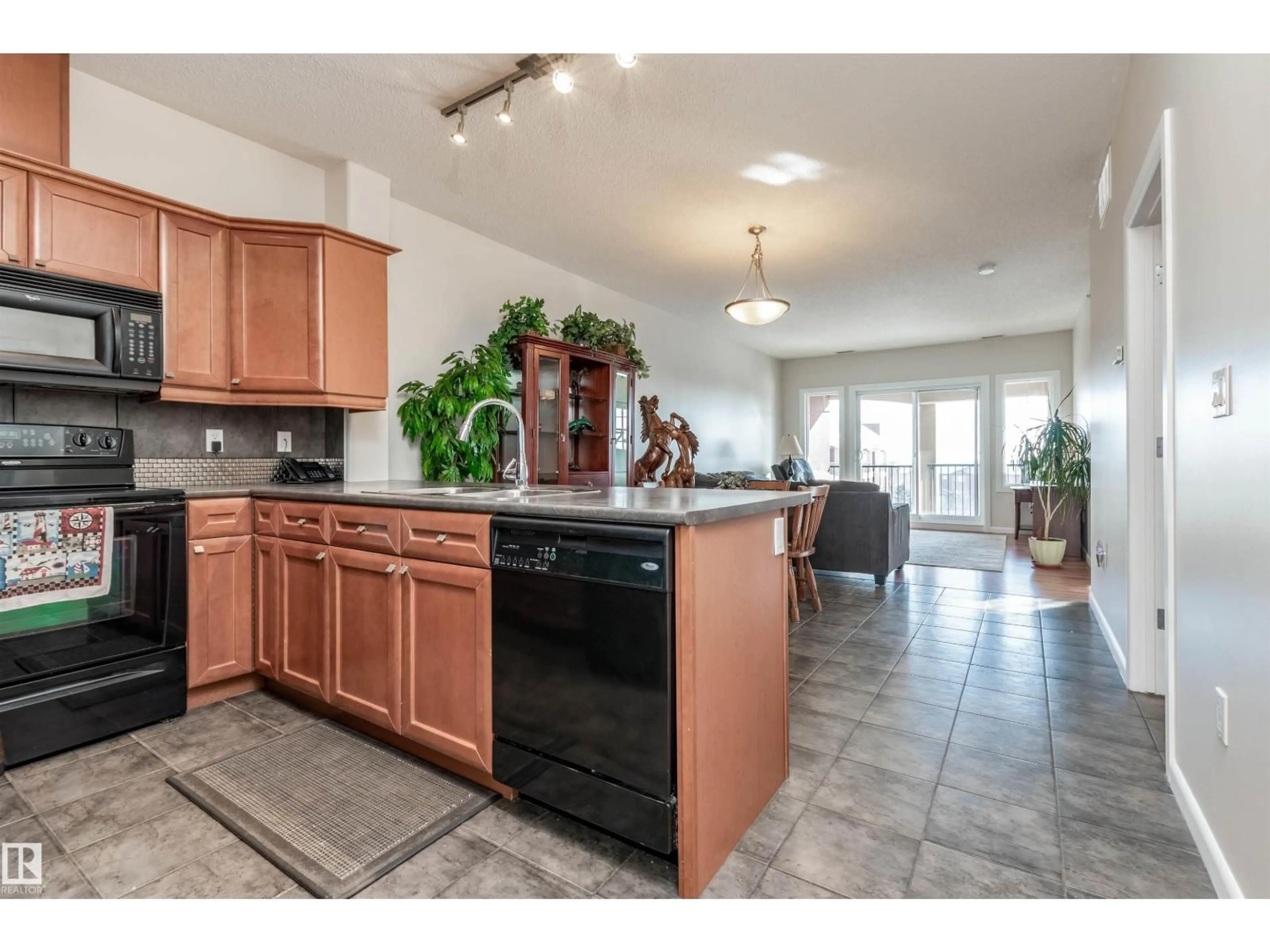 Open concept kitchen, ceramic/tile floor for 300 - 439 PALISADES WY, Sherwood Park Alberta T8H2T9