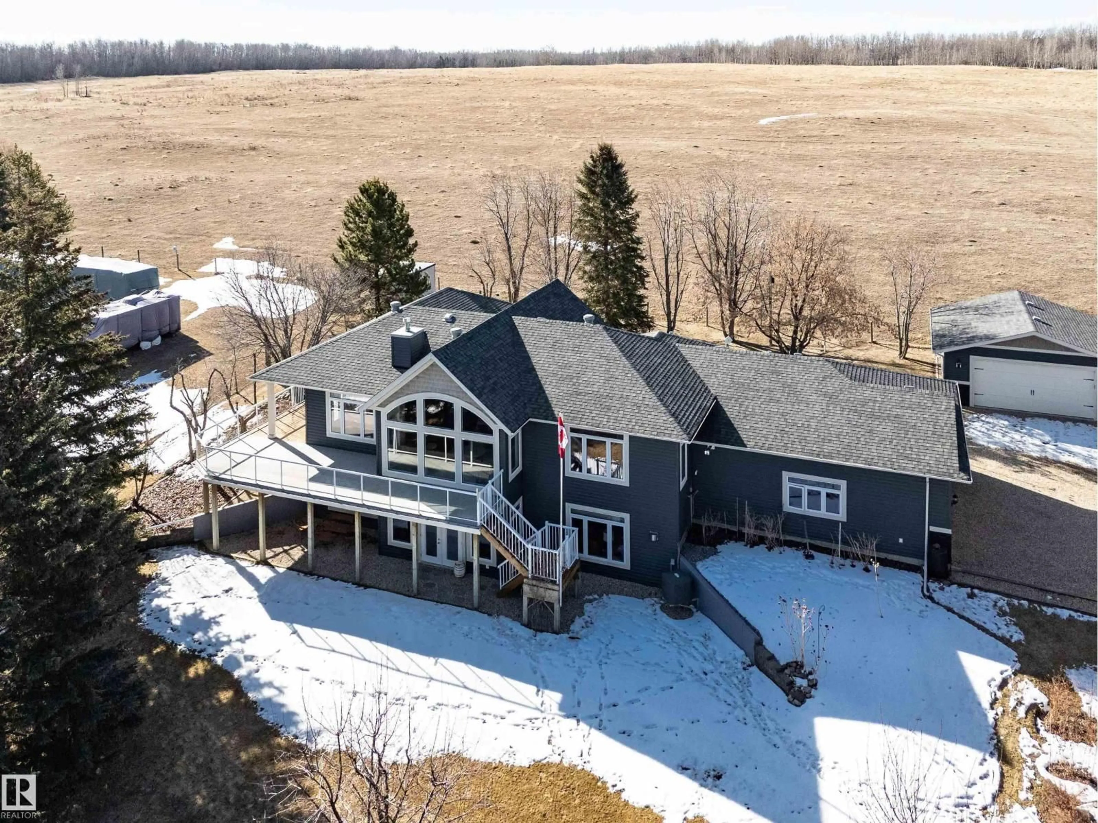 A pic from outside/outdoor area/front of a property/back of a property/a pic from drone, water/lake/river/ocean view for 268 LAKESHORE DR, Rural Wetaskiwin County Alberta T0C2V0