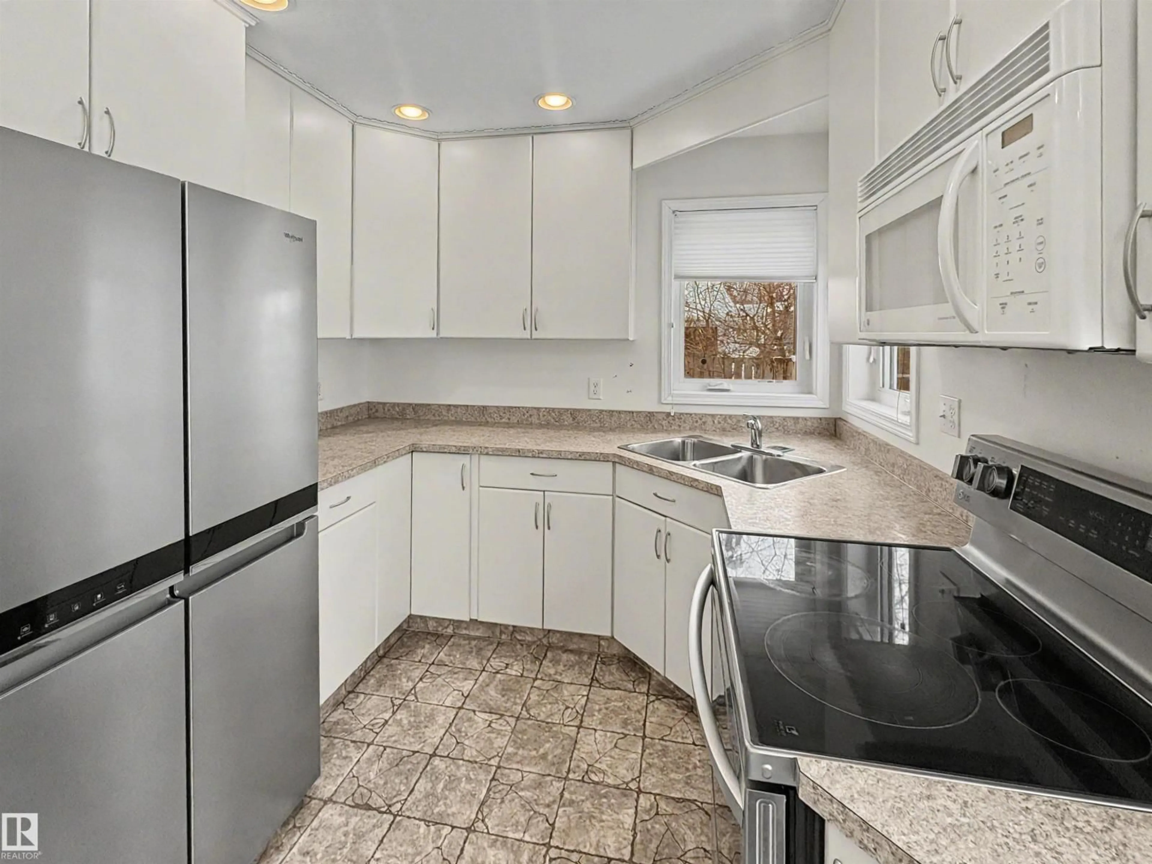 Standard kitchen, ceramic/tile floor for 4 KINGBIRD RD, Rural Bonnyville M.D. Alberta T9N2J6