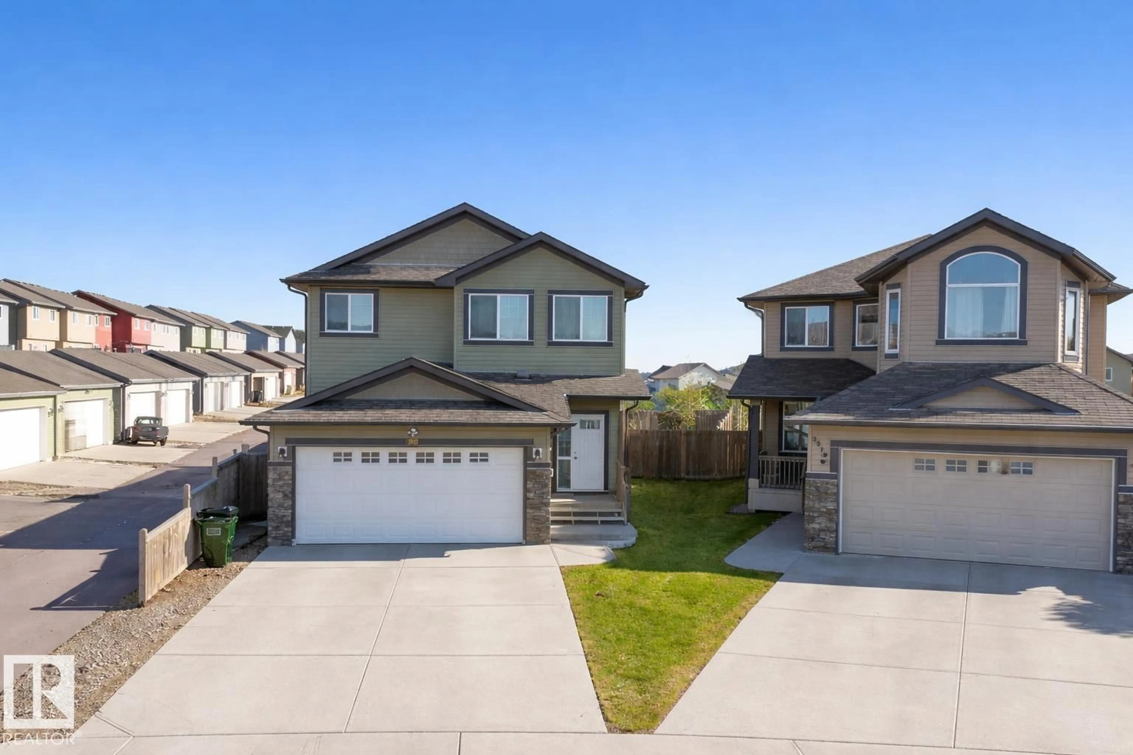 A pic from outside/outdoor area/front of a property/back of a property/a pic from drone, street for 3215 22 AV, Edmonton Alberta T6T0K6