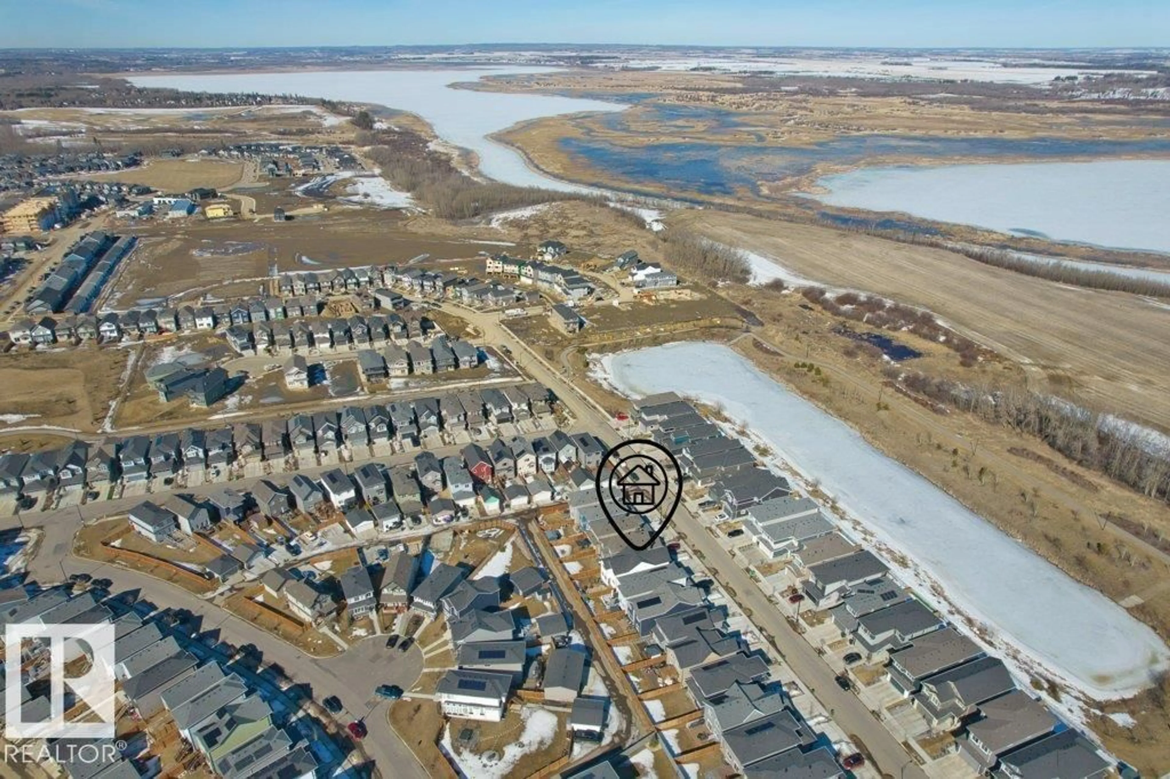 A pic from outside/outdoor area/front of a property/back of a property/a pic from drone, water/lake/river/ocean view for 21003 131 AV, Edmonton Alberta T5S0P4