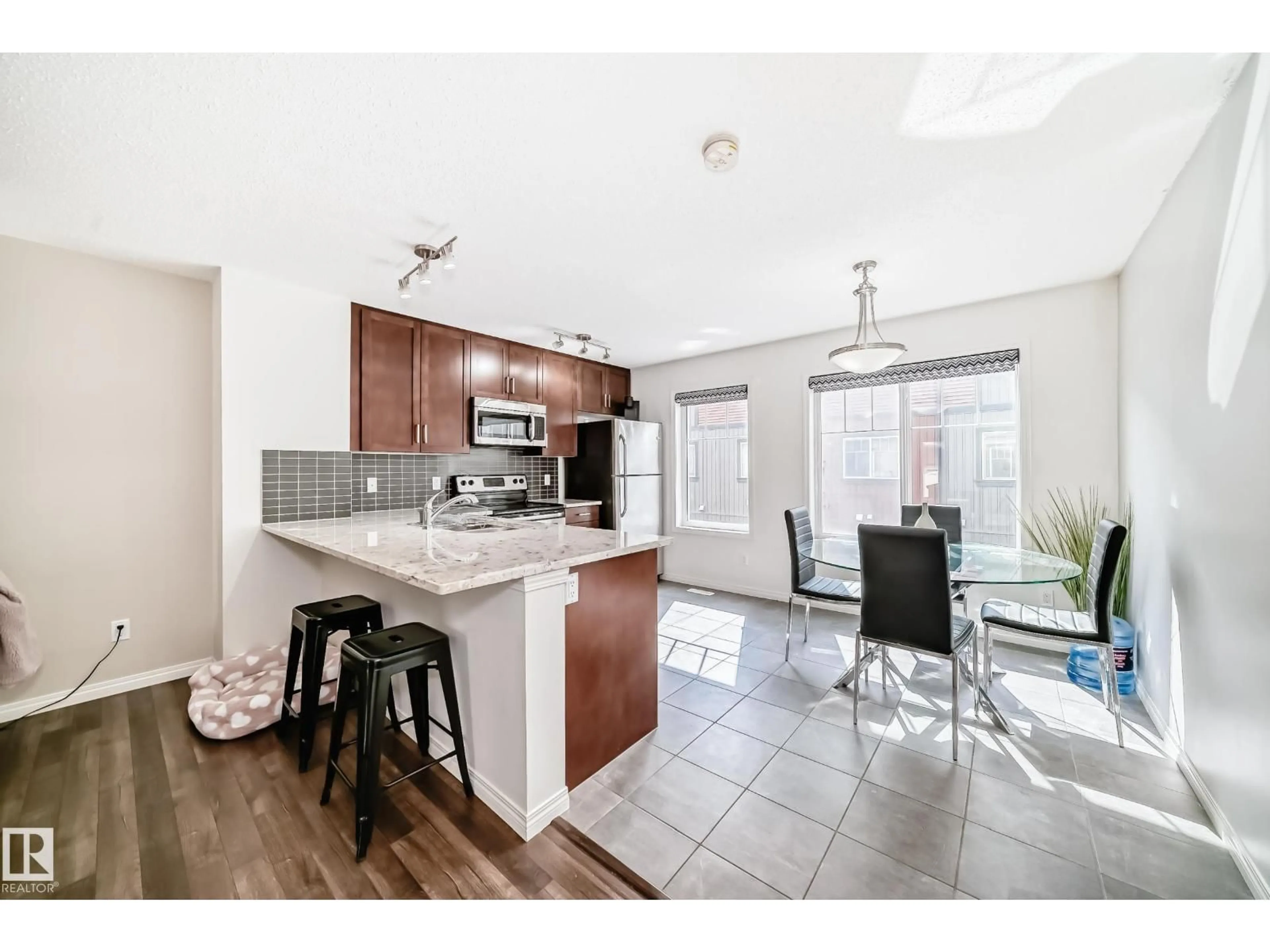 Open concept kitchen, unknown for #81 - 3305 ORCHARDS LINK LI, Edmonton Alberta T6X2H1