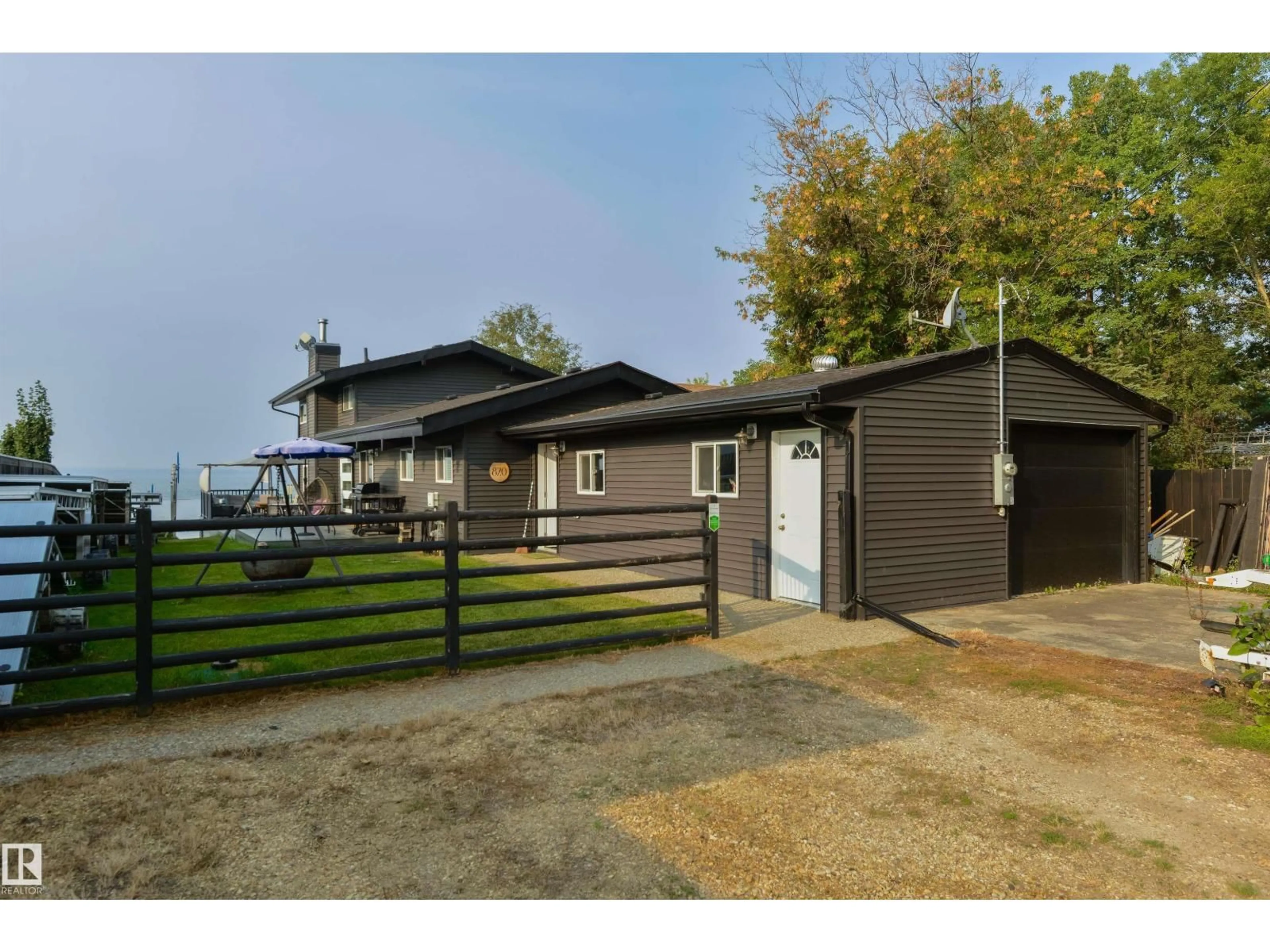 A pic from outside/outdoor area/front of a property/back of a property/a pic from drone, street for 820 8 ST, Rural Lac Ste. Anne County Alberta T0E1A0